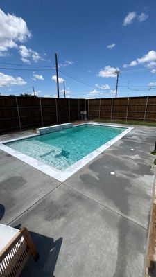Compact Geometric Pool with Crisp White Interior