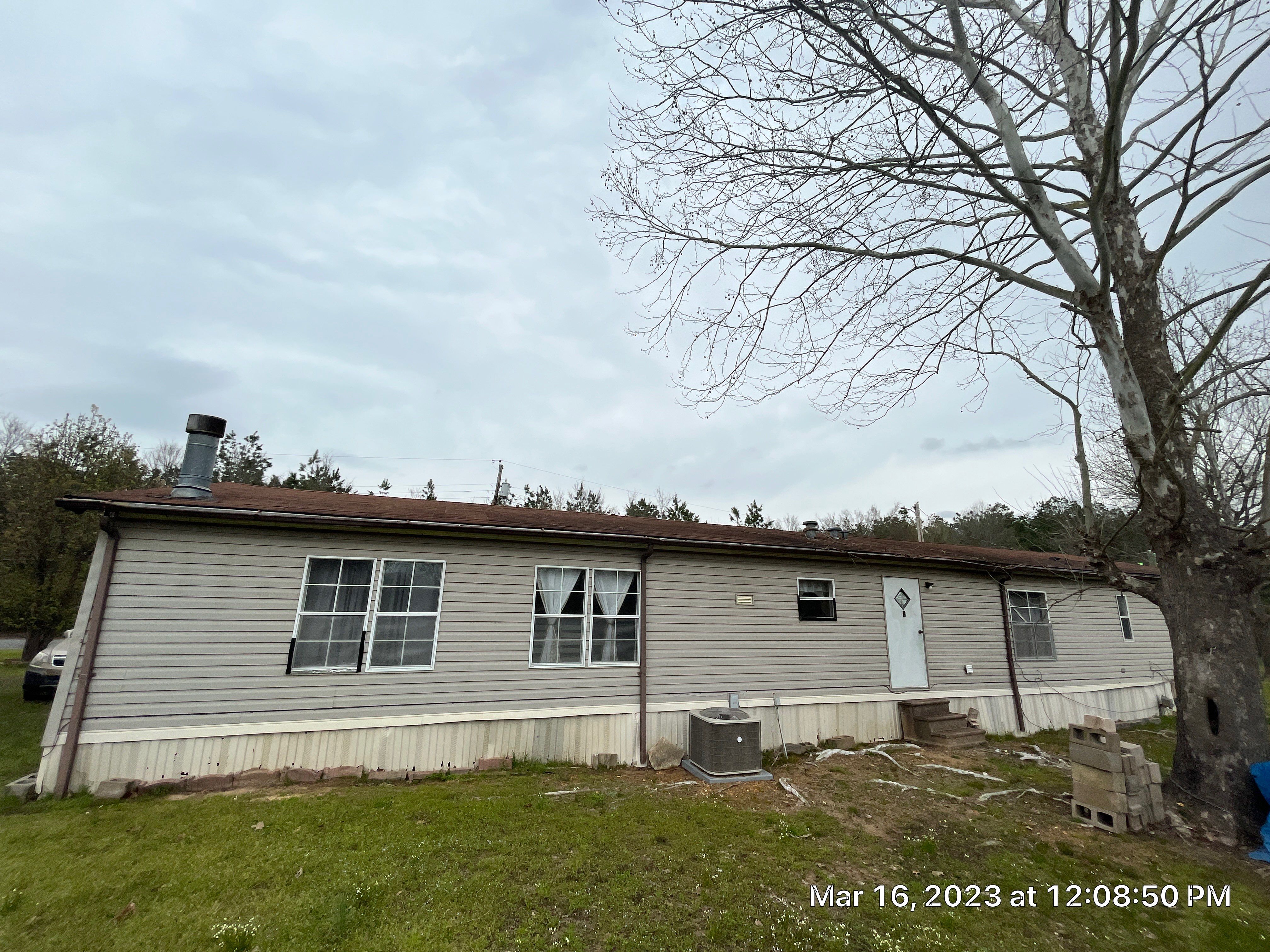 Storm Restoration Reroof: 25 Year 3-Tab Shingle by Hostetler Roofing