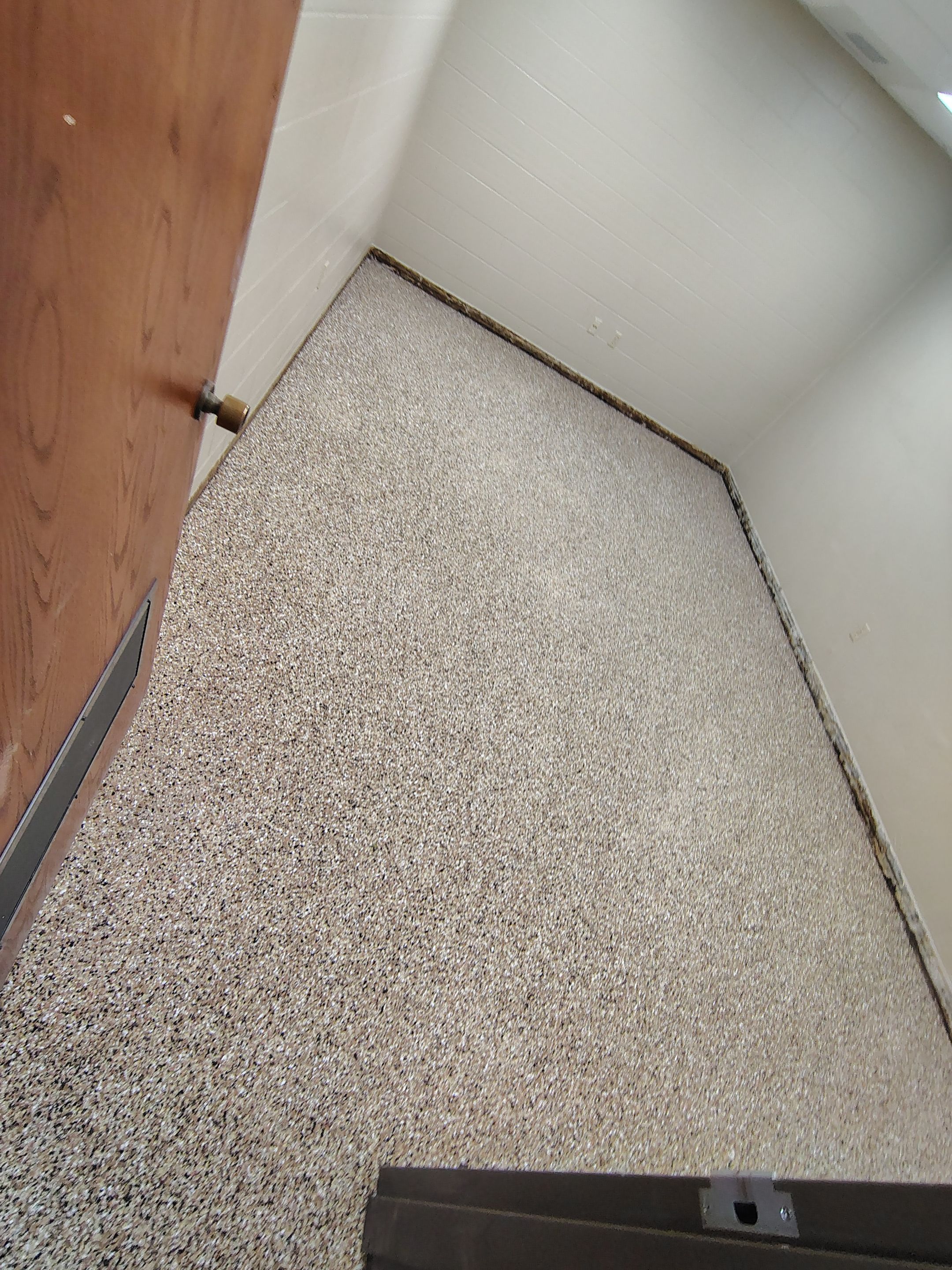 Industrial Flake Epoxy Floor Installation at Pierre National Guard Facility by Select Painting, Coatings & Garage Cabinets