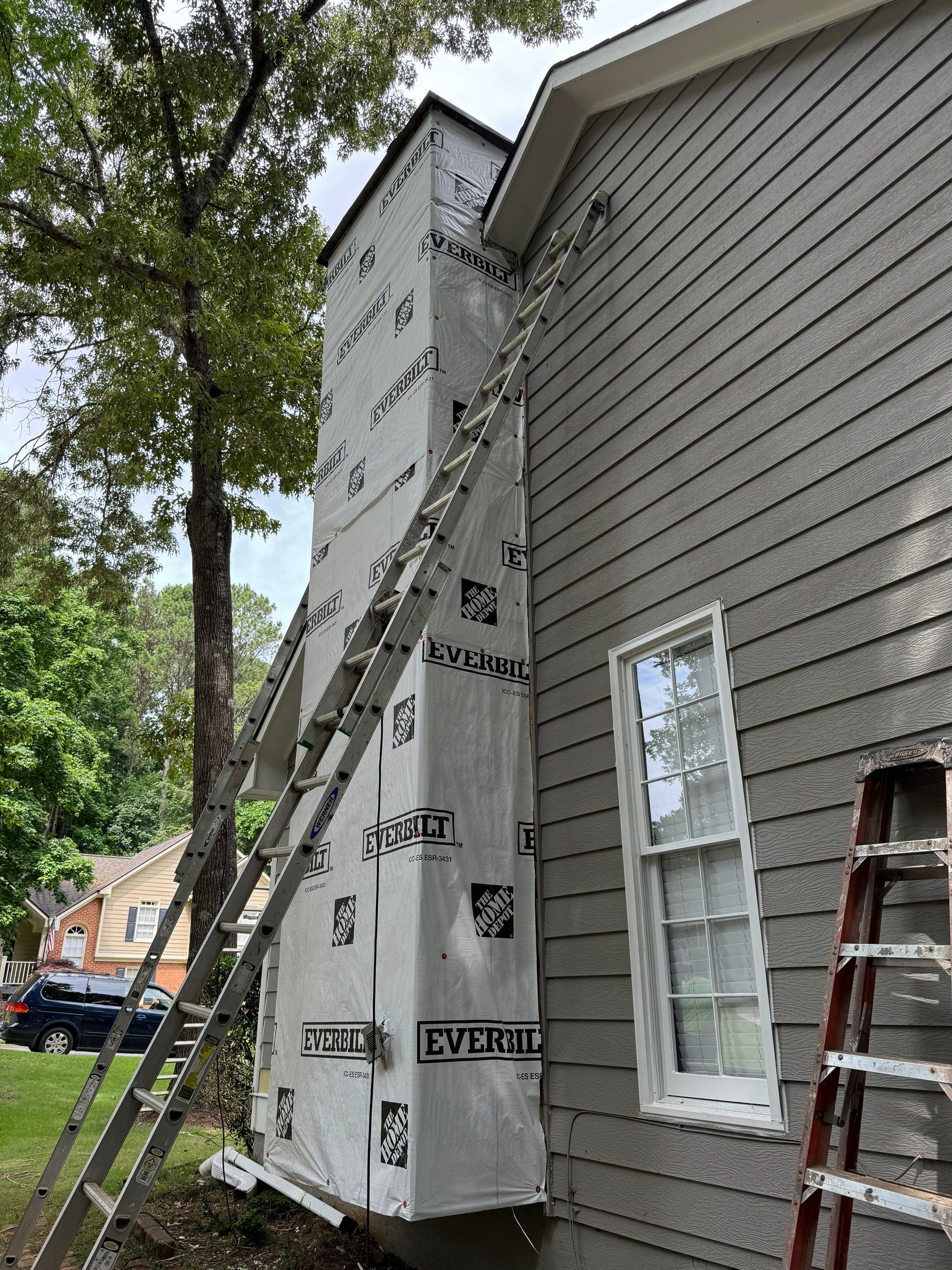 Exterior Painting and Chimney Siding Refresh in Woodstock, Georgia by Swift Home Renovations