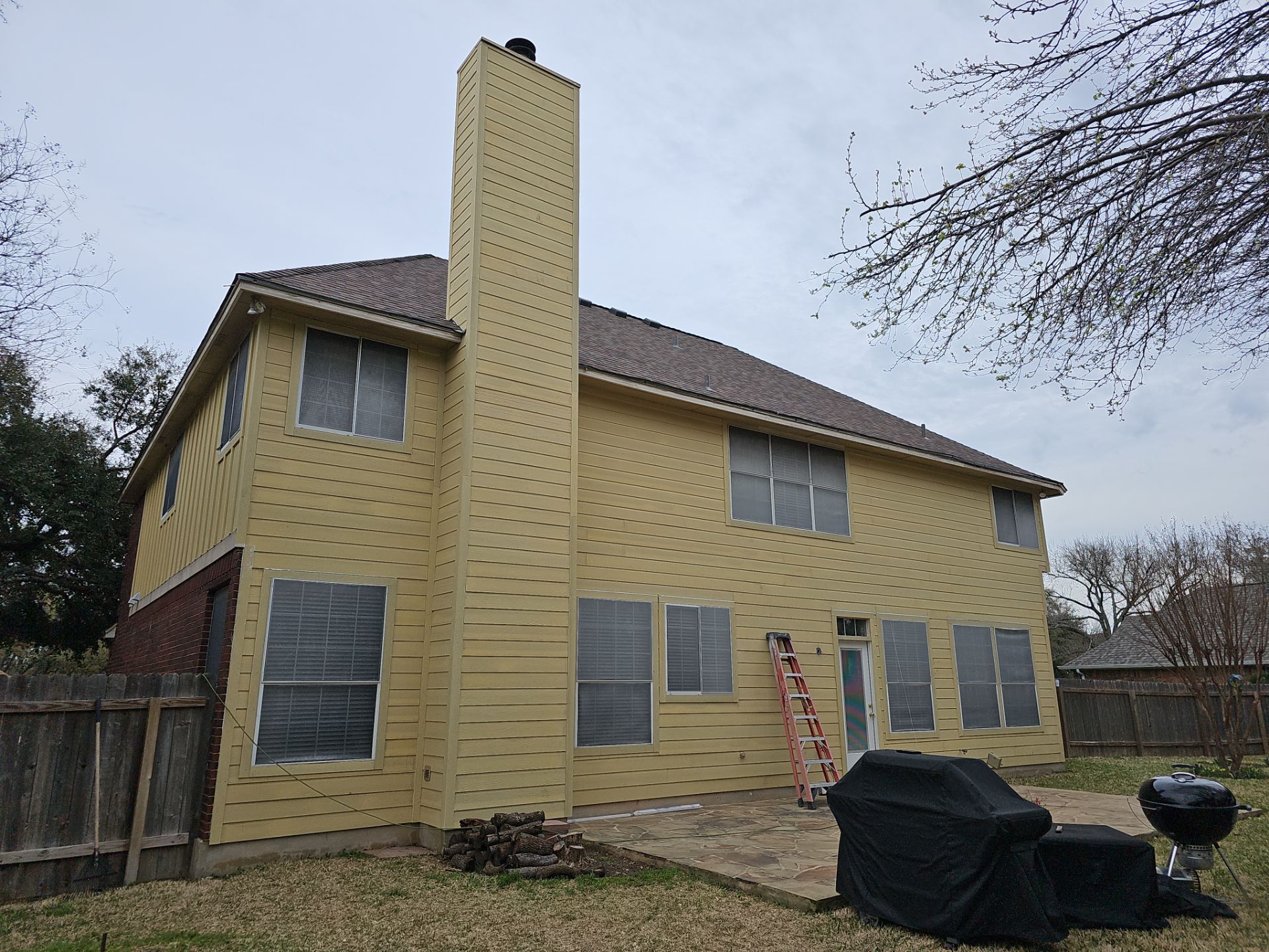 New Hardie Lap Siding & Board and Batten by DeZign Roofing & Exteriors