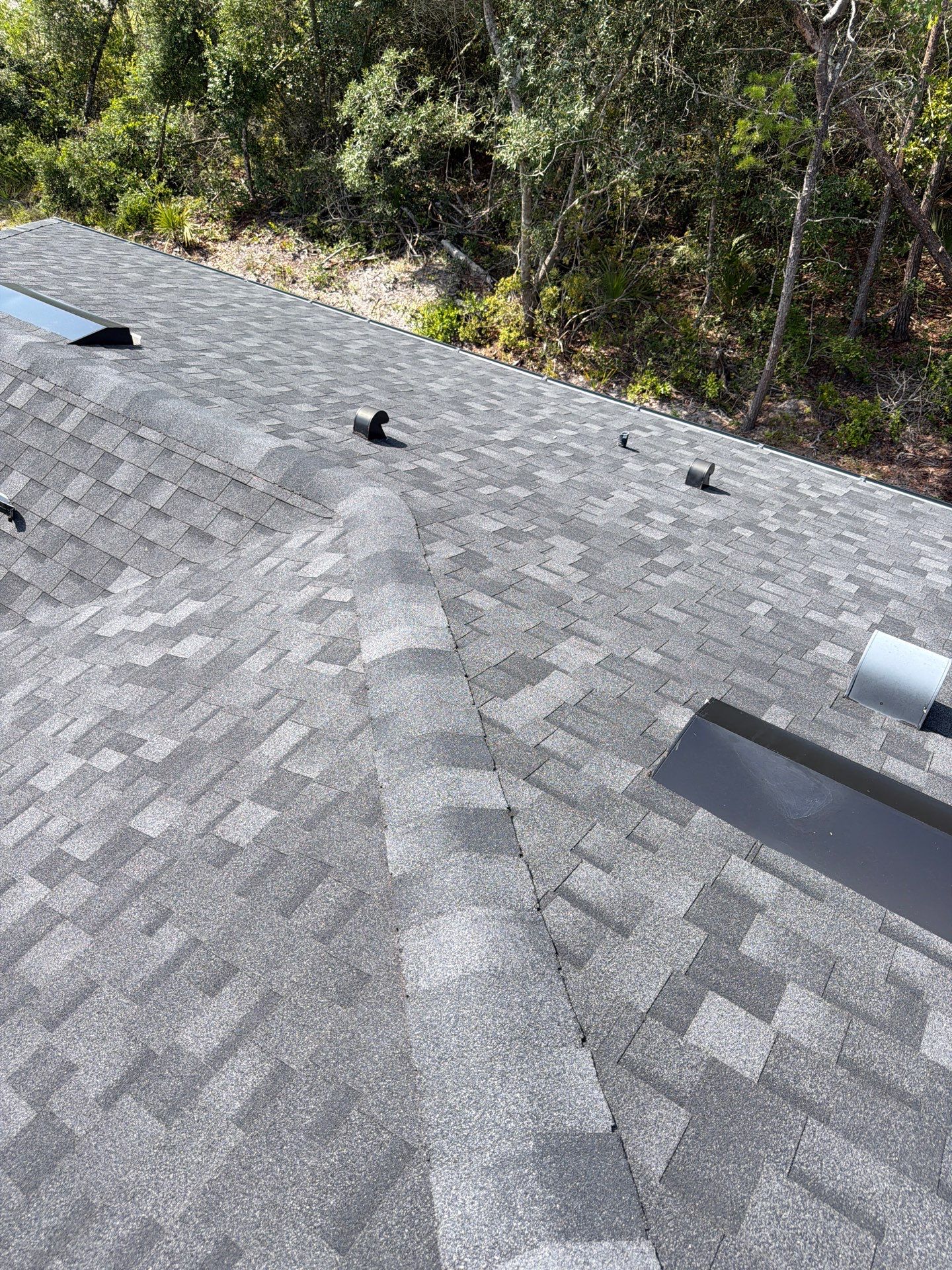 GAF Asphalt Shingle Roof Replacement with Skylight in Eustis by Fortified Roofing Solutions Corp.