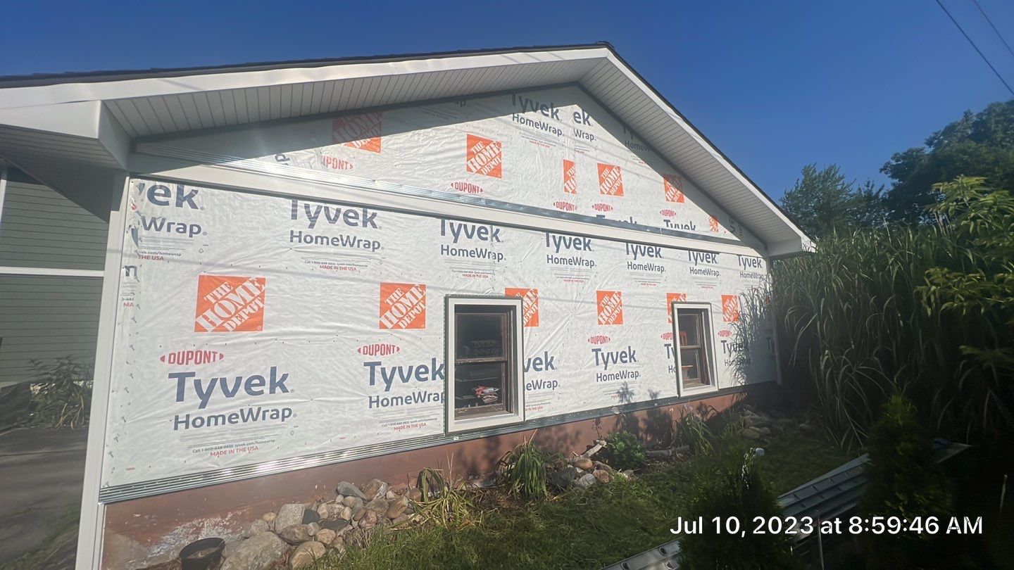 Siding Installation using CertainTeed Cedar Impressions by Bloomfield Construction & Restoration