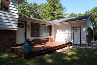 Exterior Remodel & Custom Deck by Cutting Edge Homes