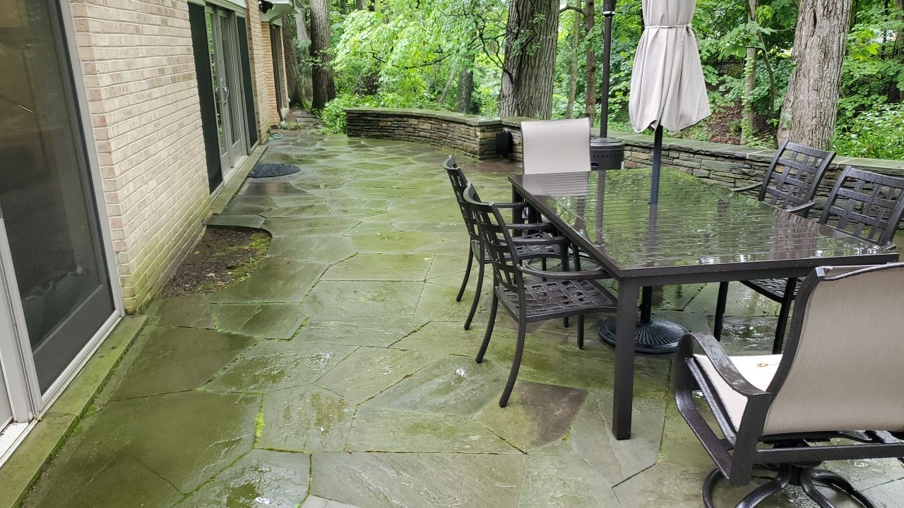 Bluestone patio cleaning by Northern Power Washing LLC.