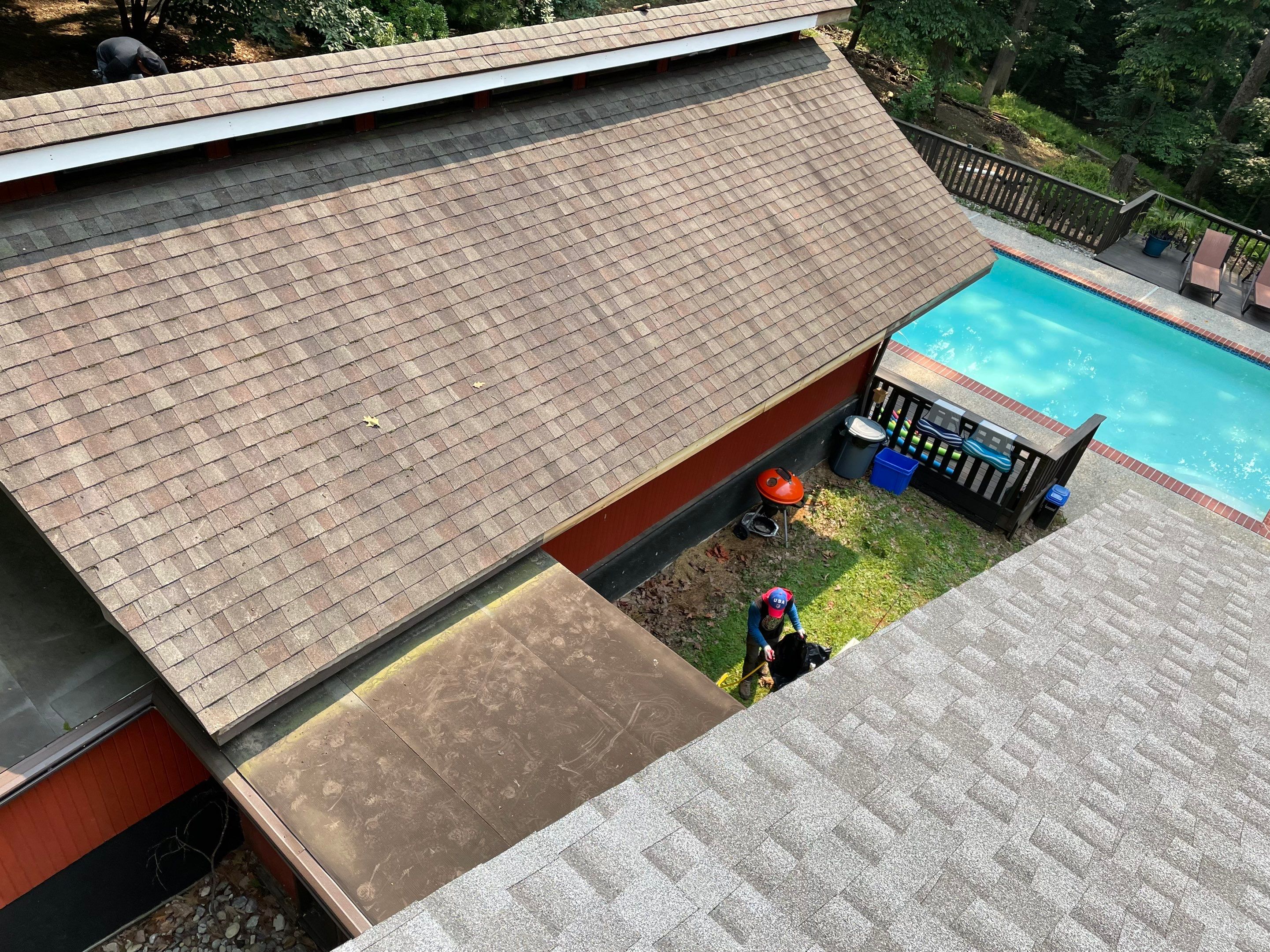 Deckhouse Roof Replacement by American Home Contractors