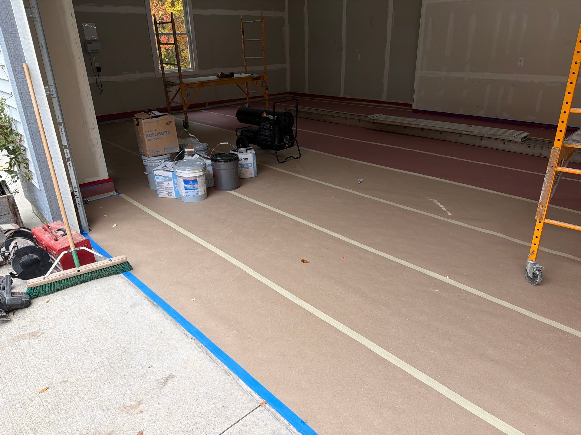 Hudsonville Garage Renovation Featuring Finished Drywall and Flake Epoxy Floors by Gordon Painting