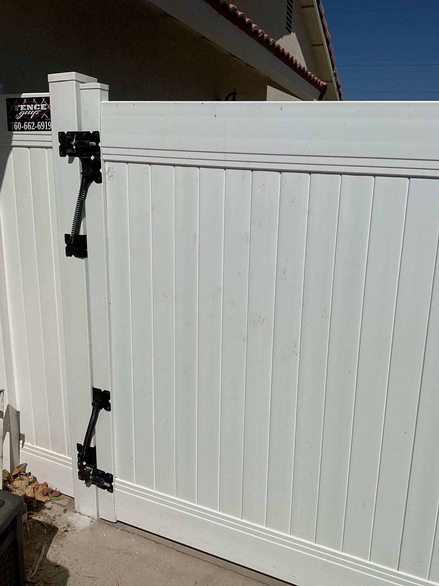 Gate installation using Vinyl by Fence Guys Inc. 