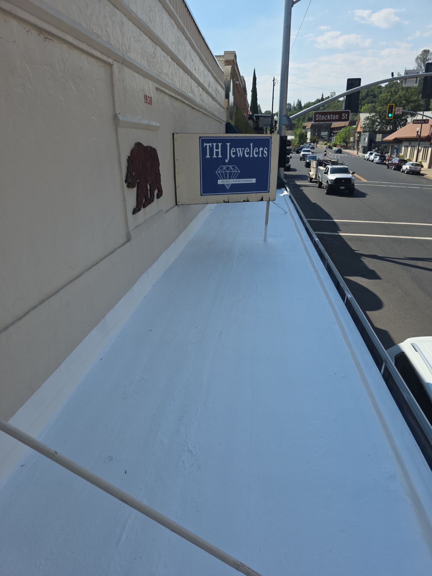 Foam and coatings on commercial roof by Straight Edge Roofing Inc