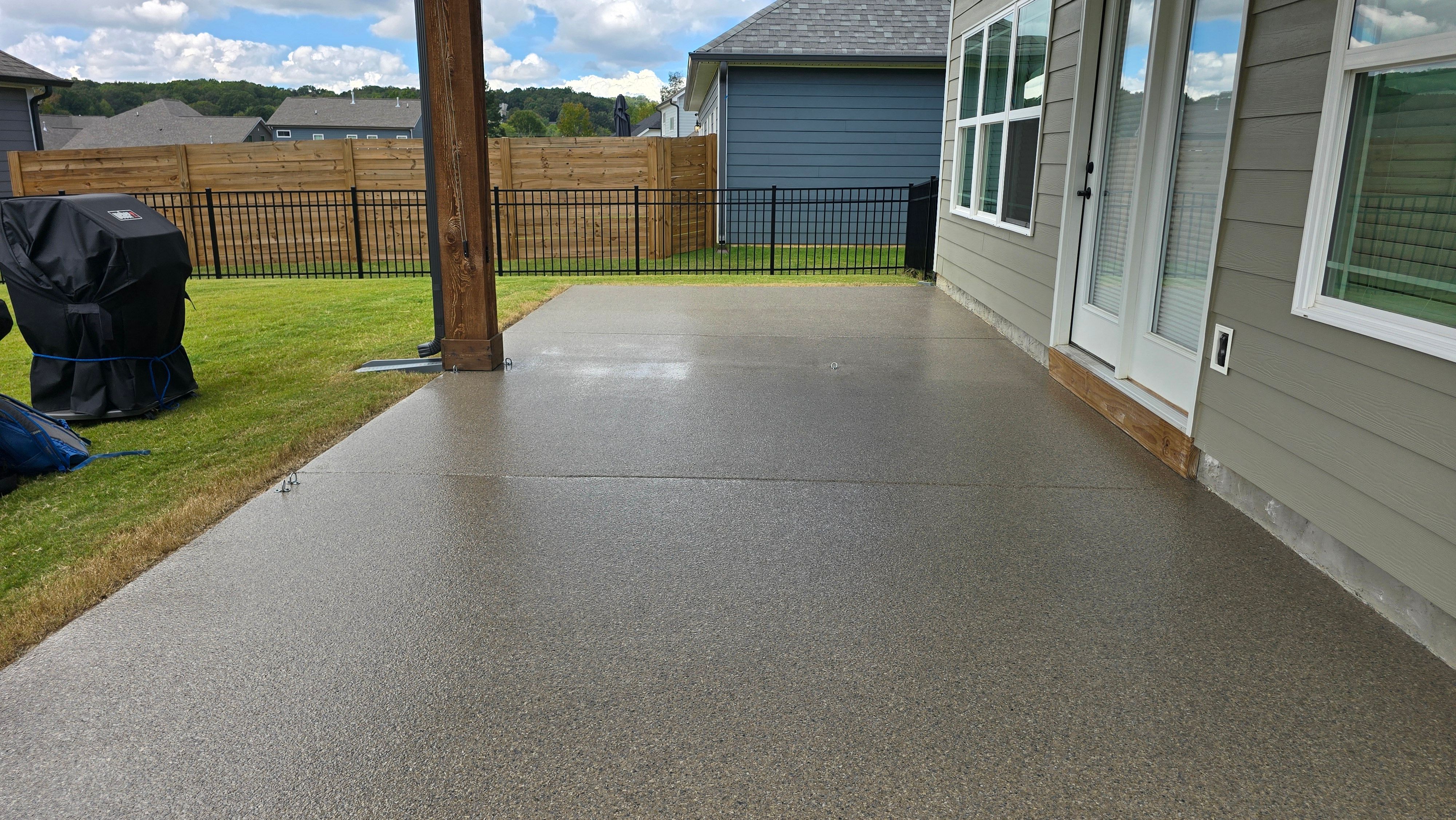Porch & Patio Completed Using Obsidian & Pumice by Elite Floor Solutions