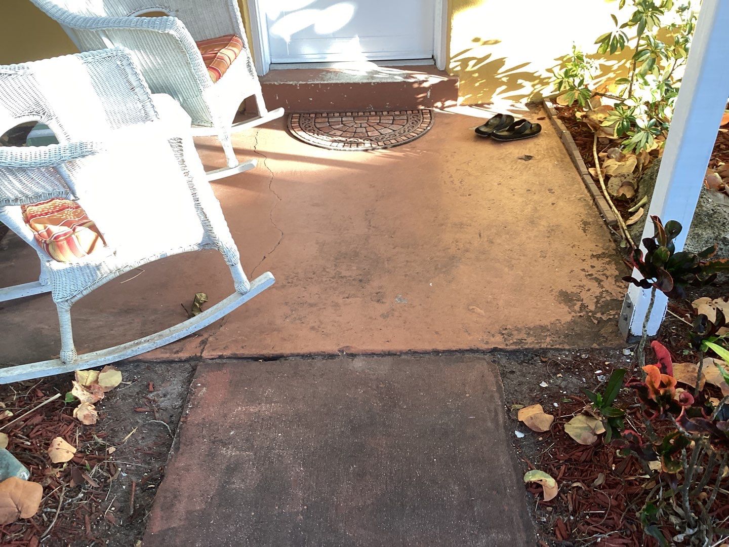 Sidewalks and Porches using Chestnut by Amvet concrete coatings llc