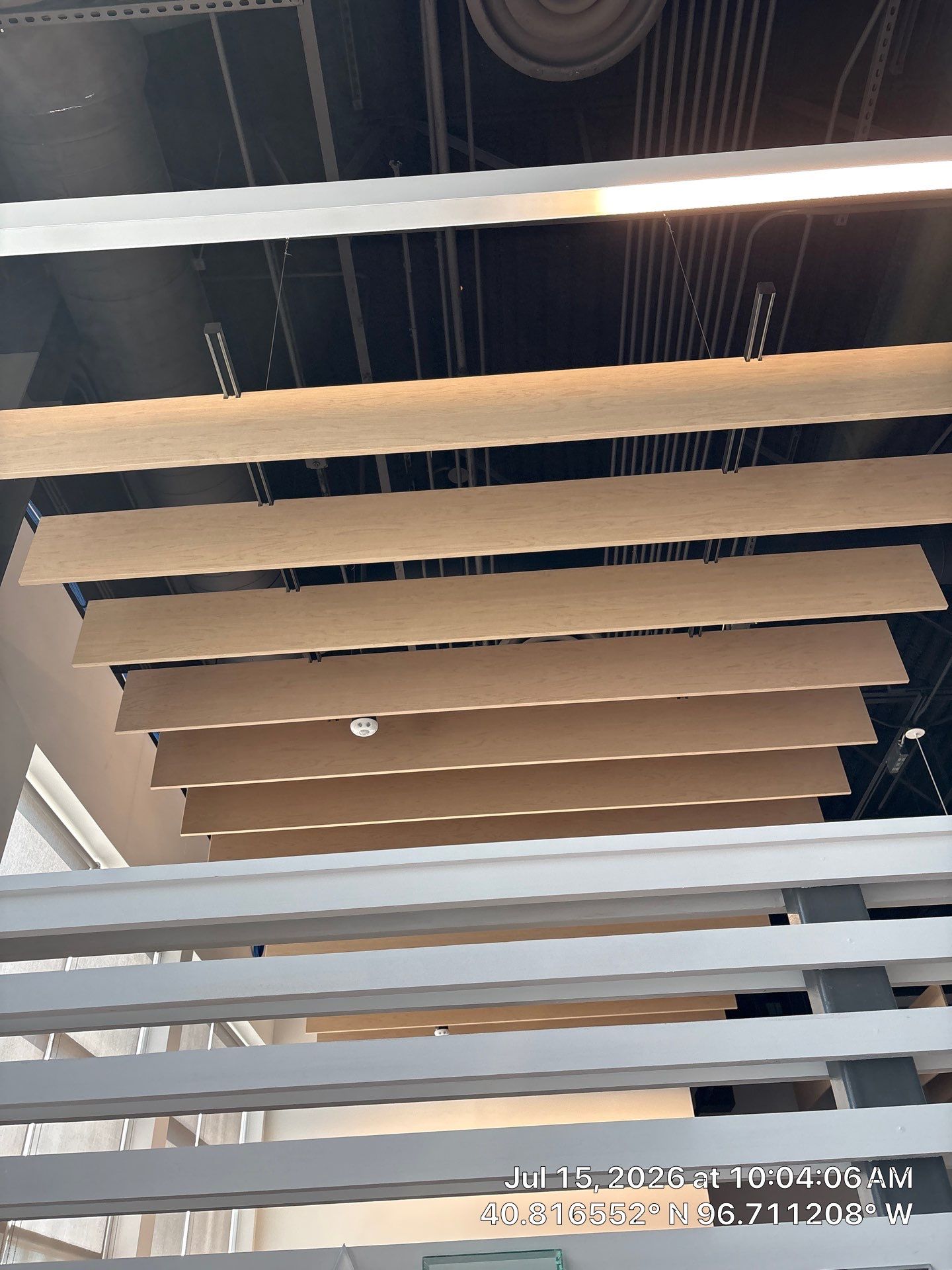 Modern Office Remodel with Wood Ceiling Baffles in Lincoln by CompanyCam Sales Demo