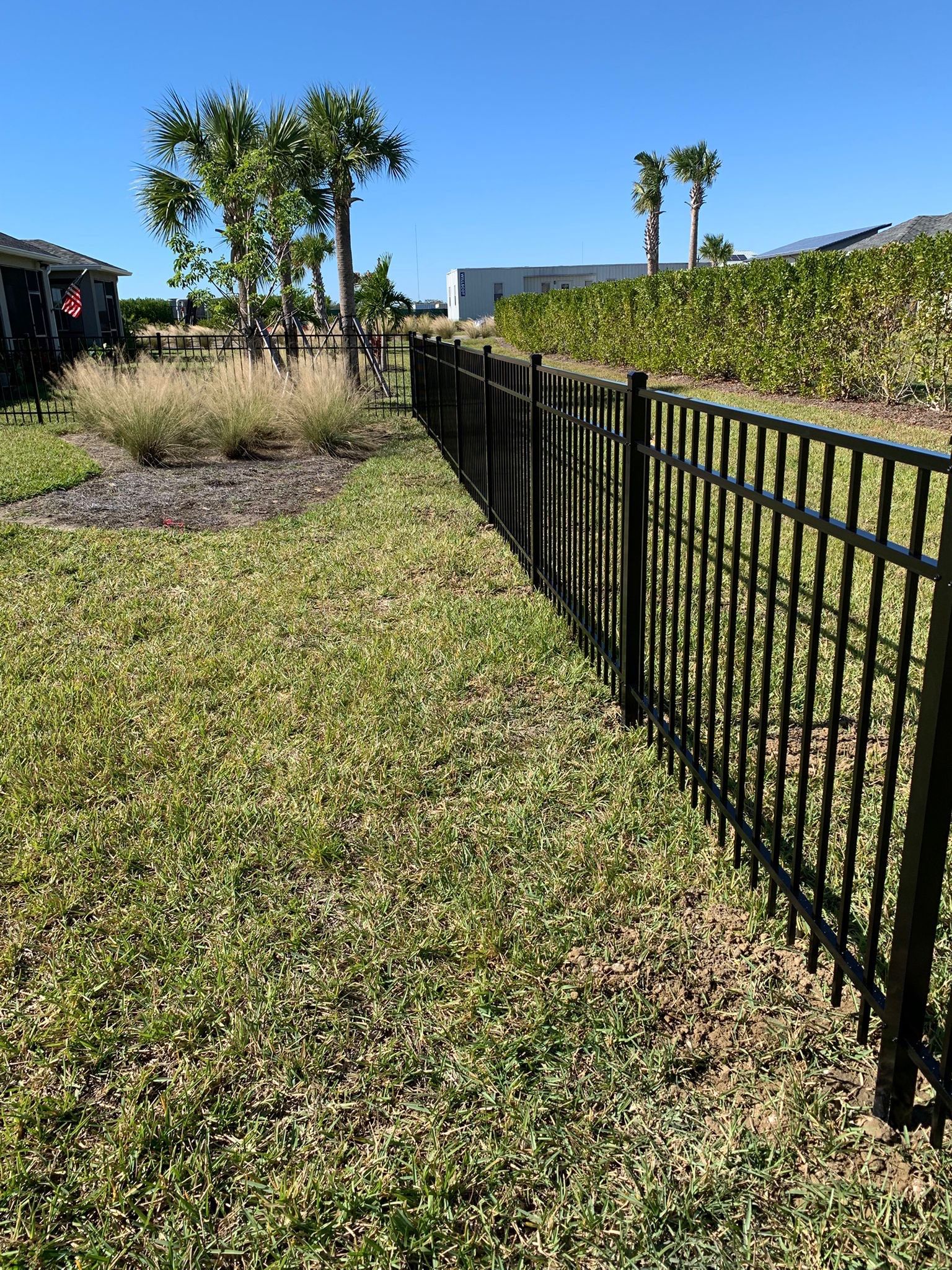 Aluminum Fence Installation using 4ft 3 Rail Black Aluminum Fence by Asap fence and gates, LLC