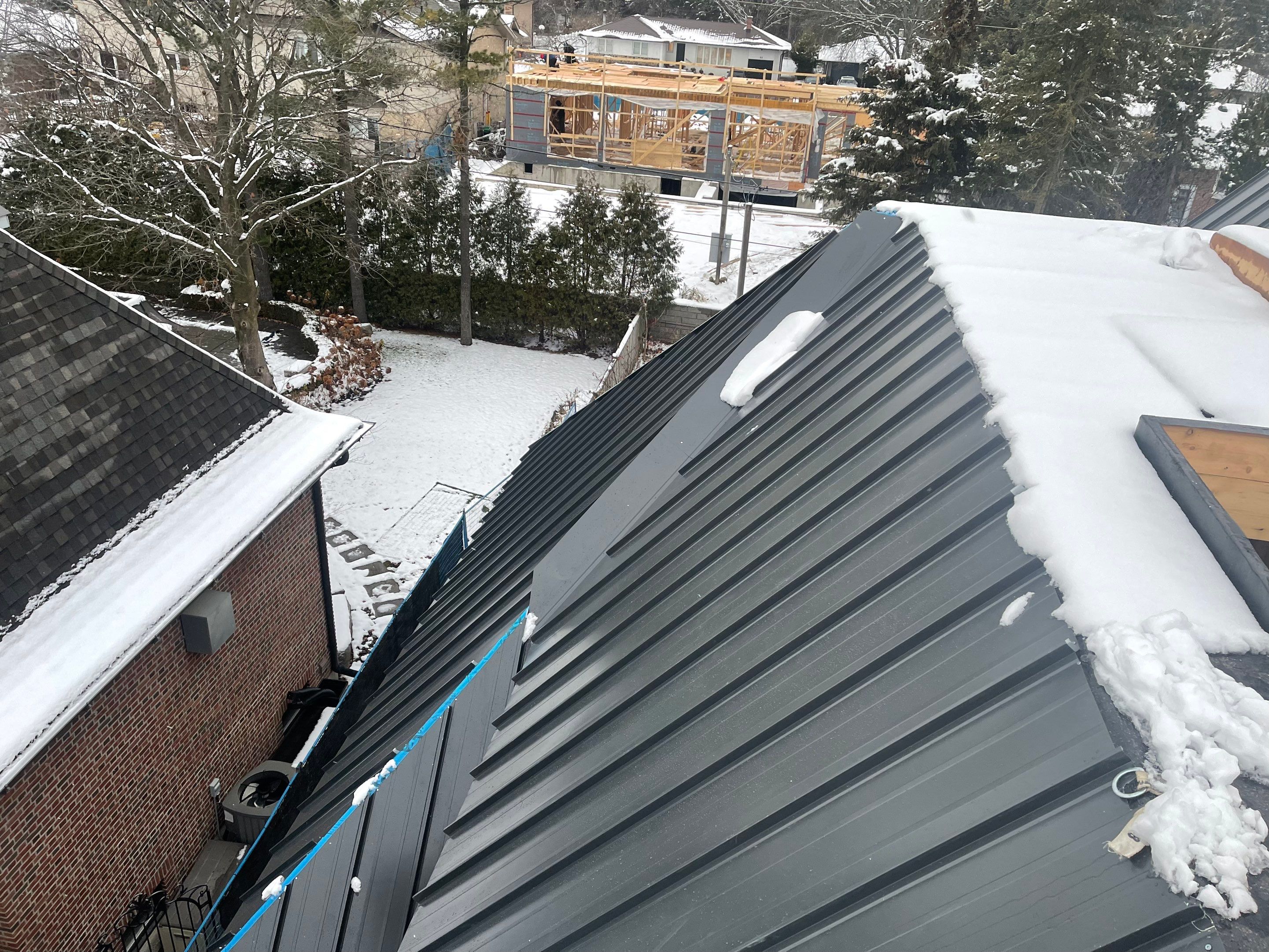 New Home Construction using 16" Standing Seam Panels by Jay Carter Roofing & Sheet Metal