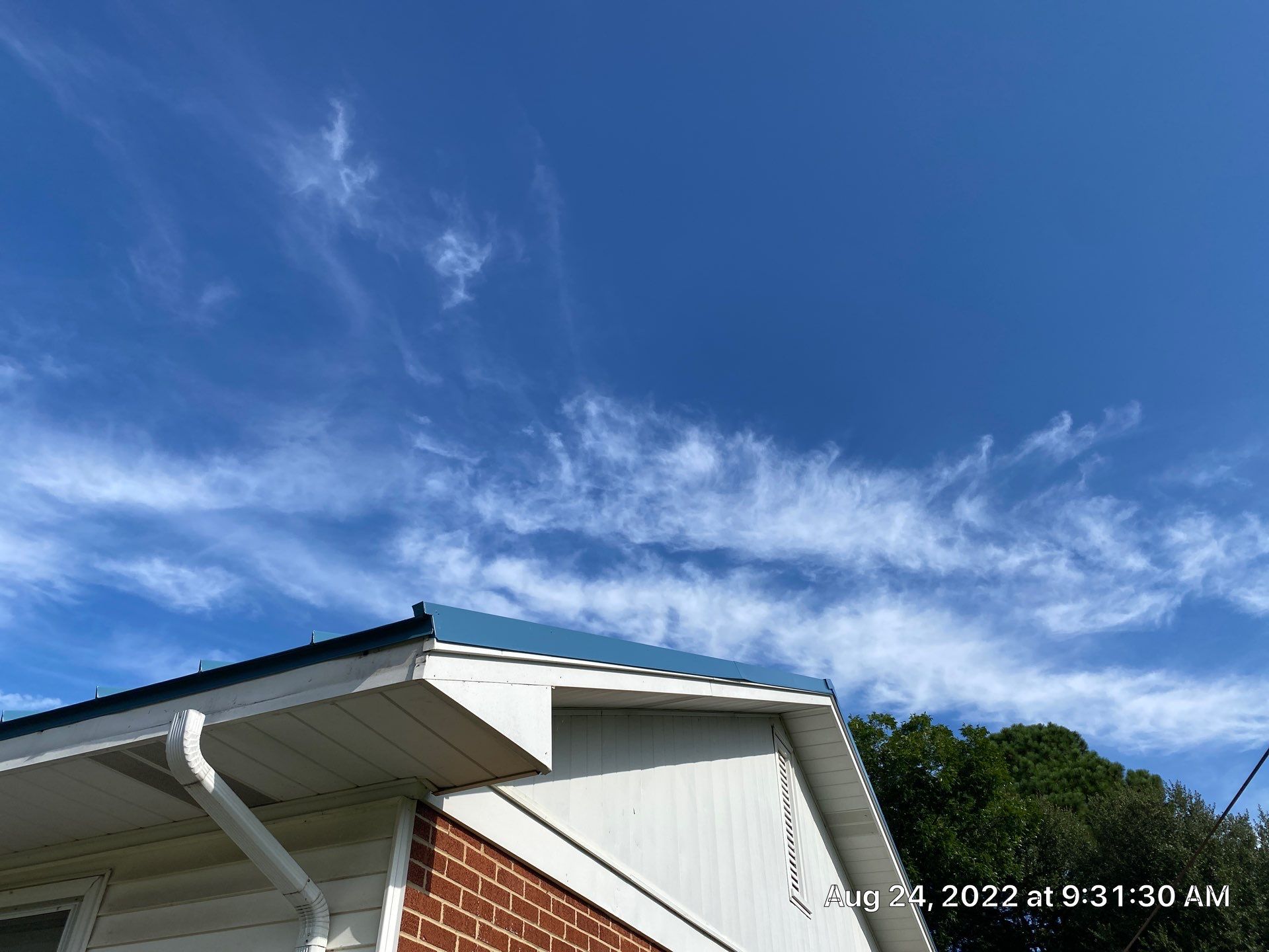 Carolina Blue Standing Seam Roof by Just In Time Roofing and Restoration