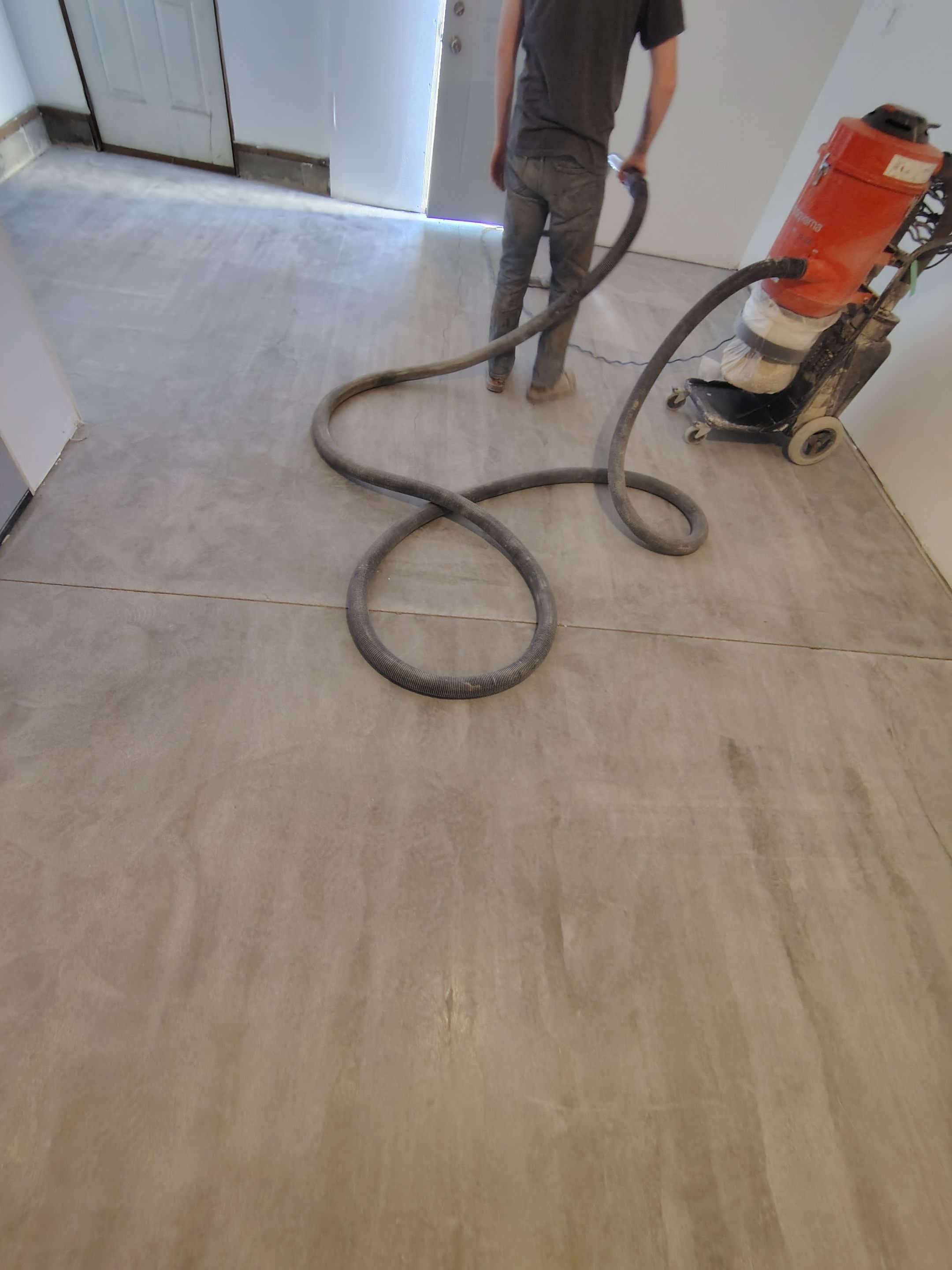 Decorative Chip Concrete Coating Installation in Luverne by Select Painting, Coatings & Garage Cabinets