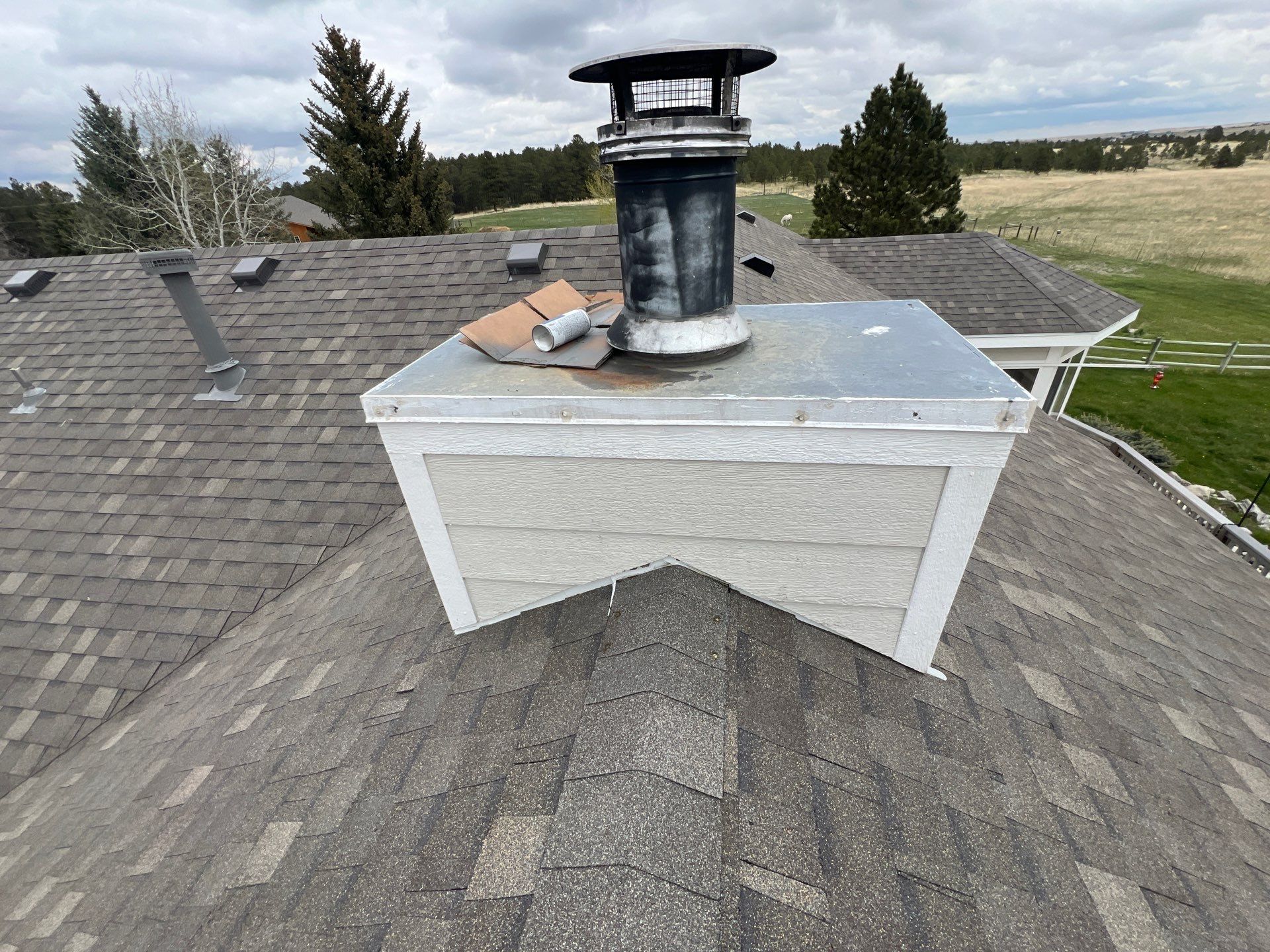 Residential Roofing Installation using Atlas Pinnacle Impact Weathered Wood by Blue Peaks Roofing LLC 