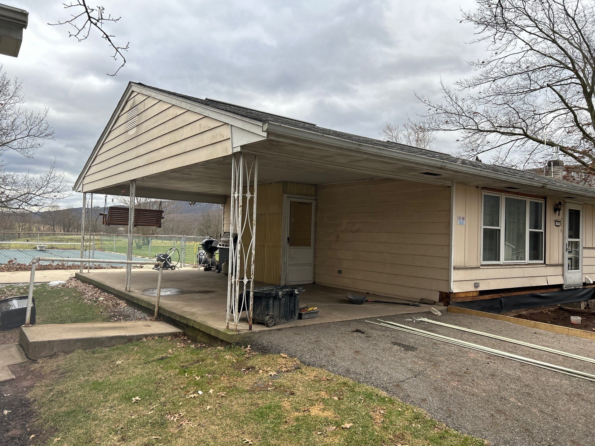 Shingle Roof- new siding- entry door by Esh Builders