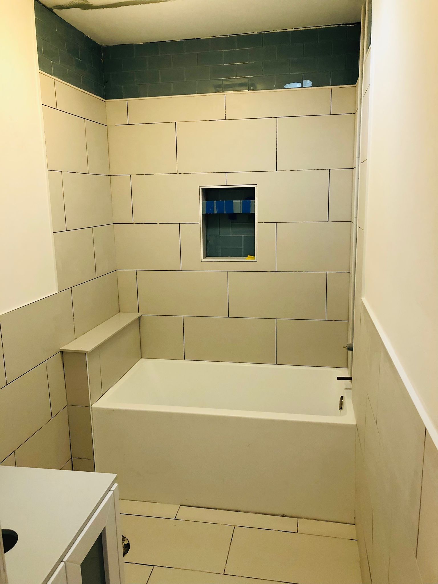 Bathroom Remodel using Tile by Home Concepts Construction