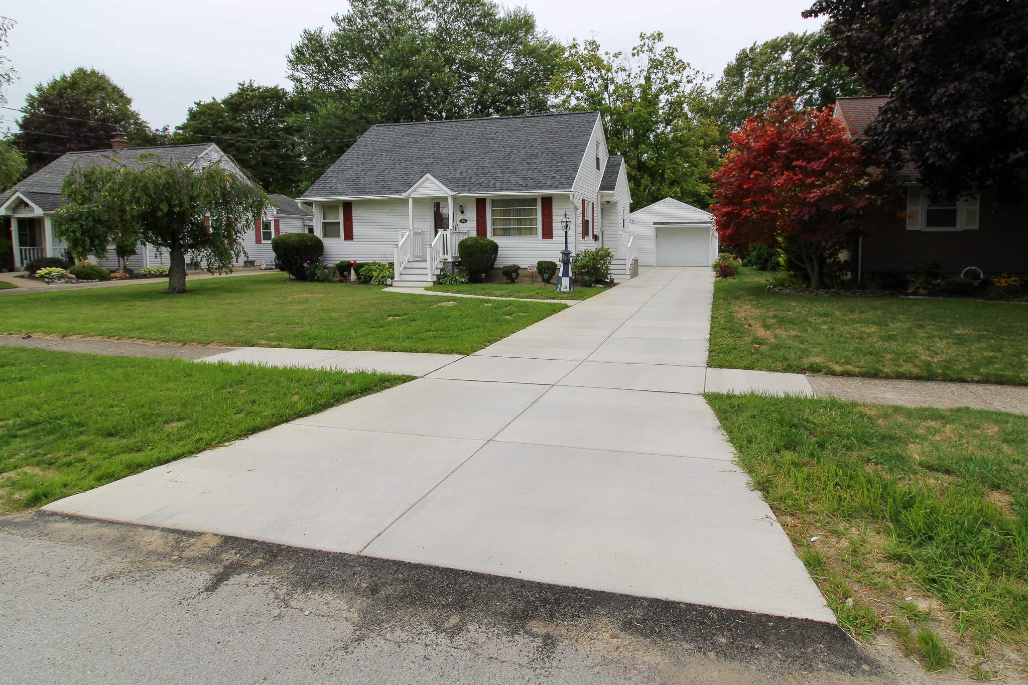 Exterior Renovations- Roofing, Siding, Concrete, and Railings  by Ivy Lea Construction