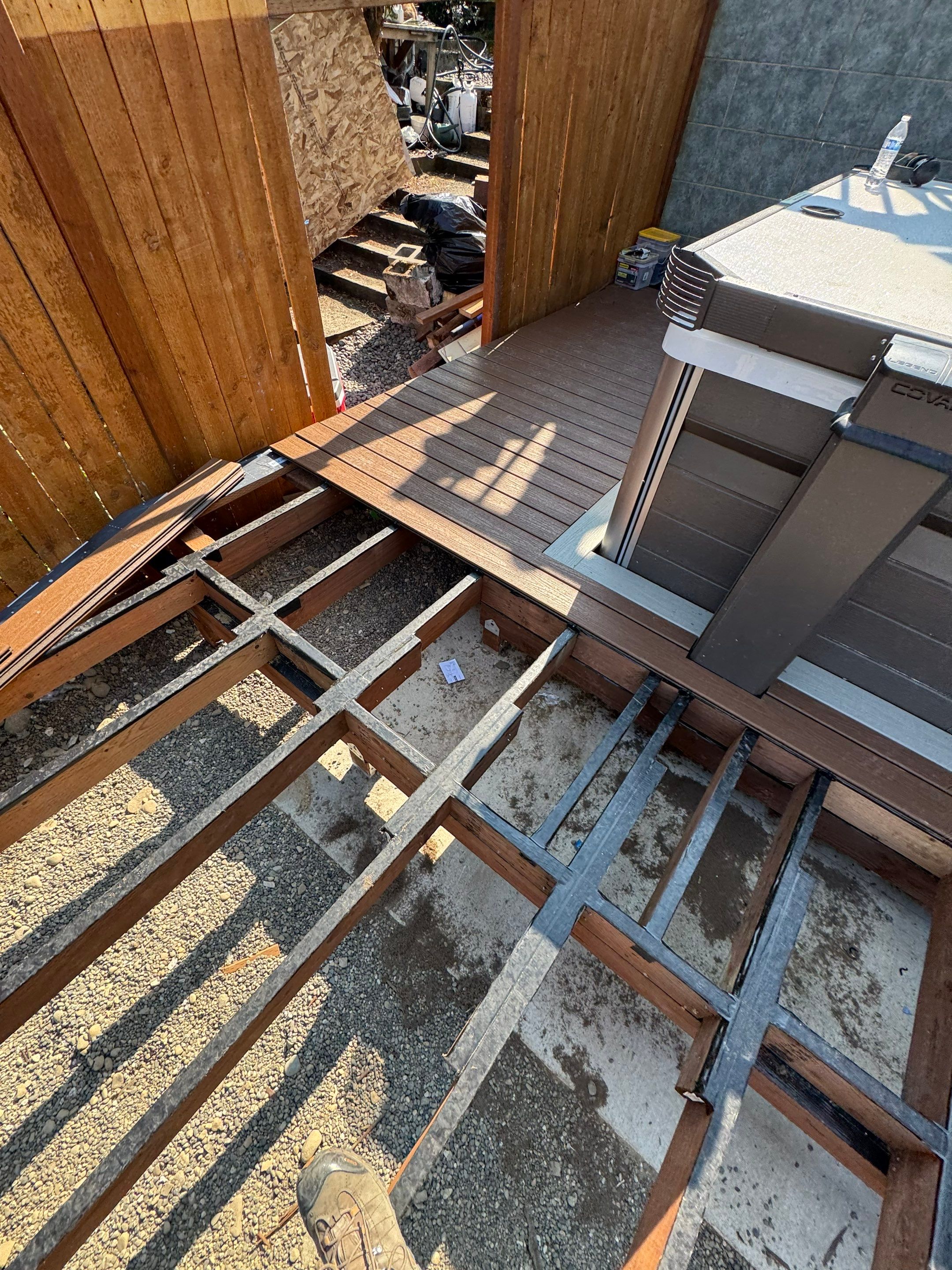 Tacoma Custom Composite Deck and Hot Tub Surround with Retaining Wall by Emerald City Energy 