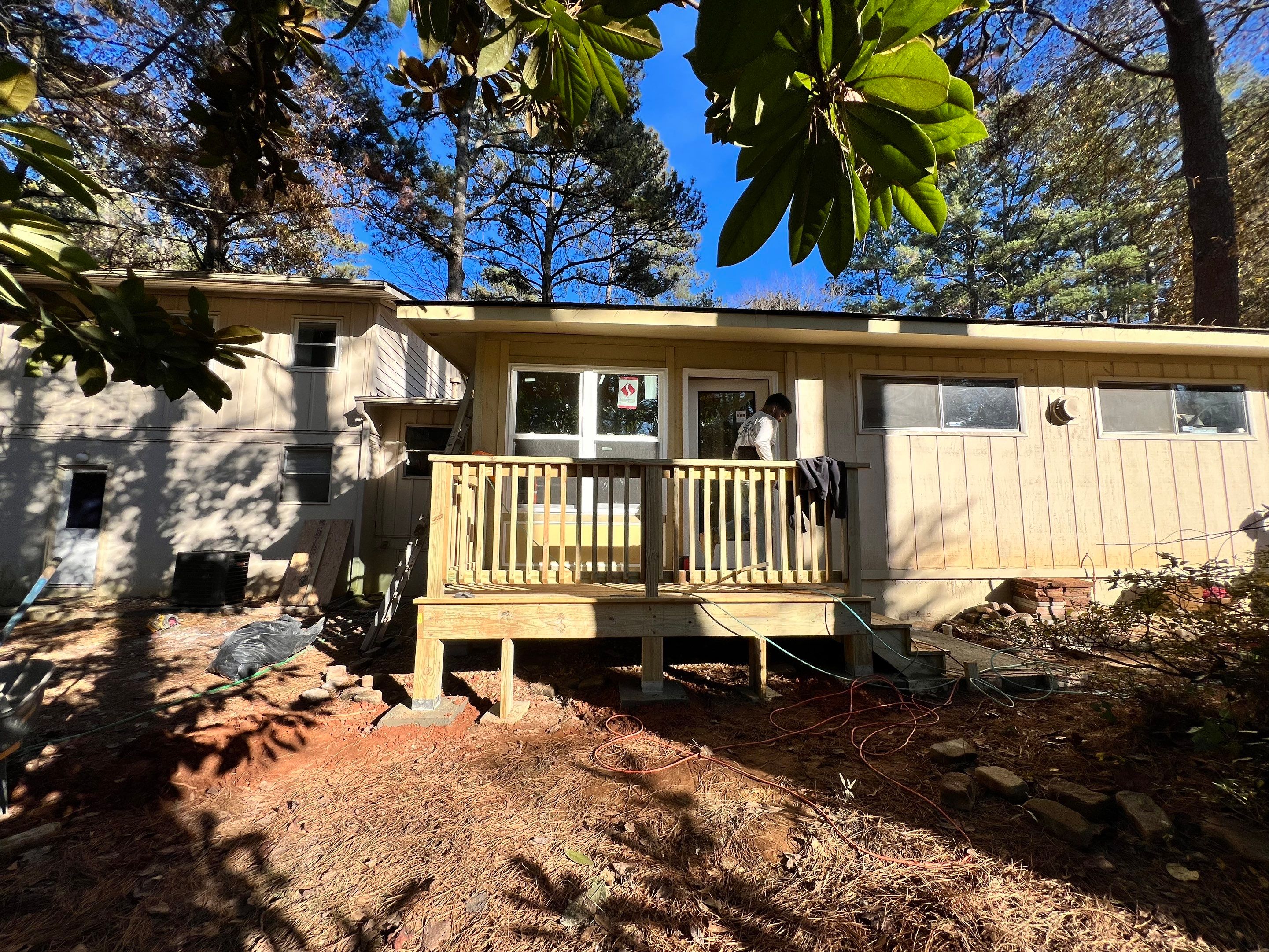 Sunroom Conversion and Pressure Treated Deck Installation in Doraville by Swift Home Renovations