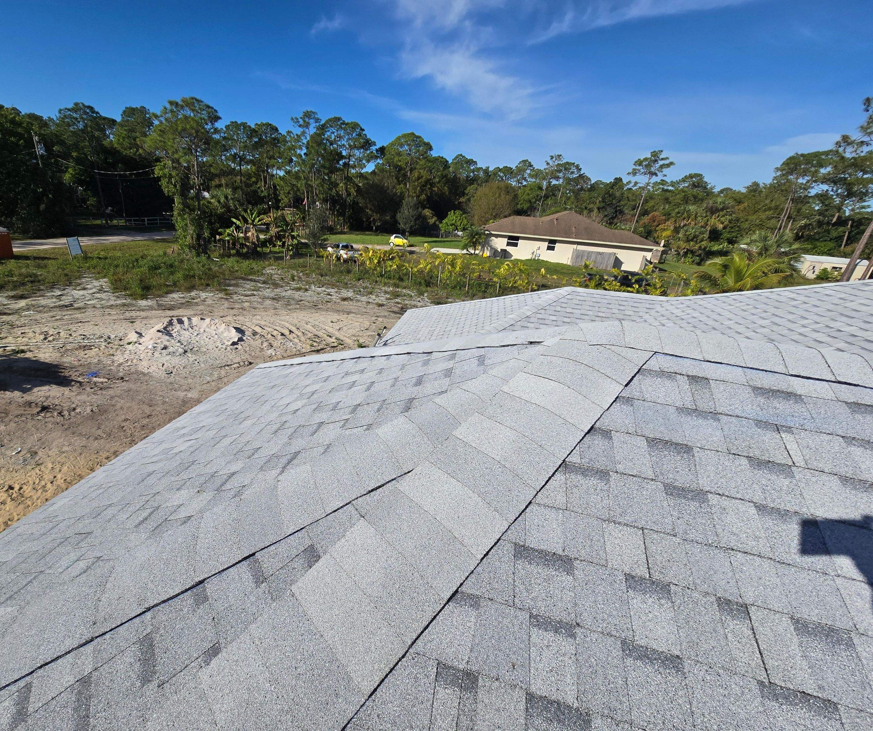 Tamko Heritage Glacier White by Total Roofing System The Metal Roof Experts