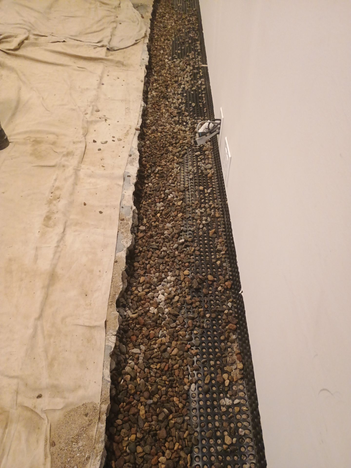 Interior Drain Tile & Sump Pump in Northwest Minneapolis by Waterproofing Northeast