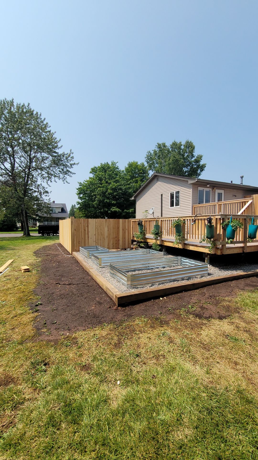 Multi-Level Cedar Deck by Anchor North Property Services
