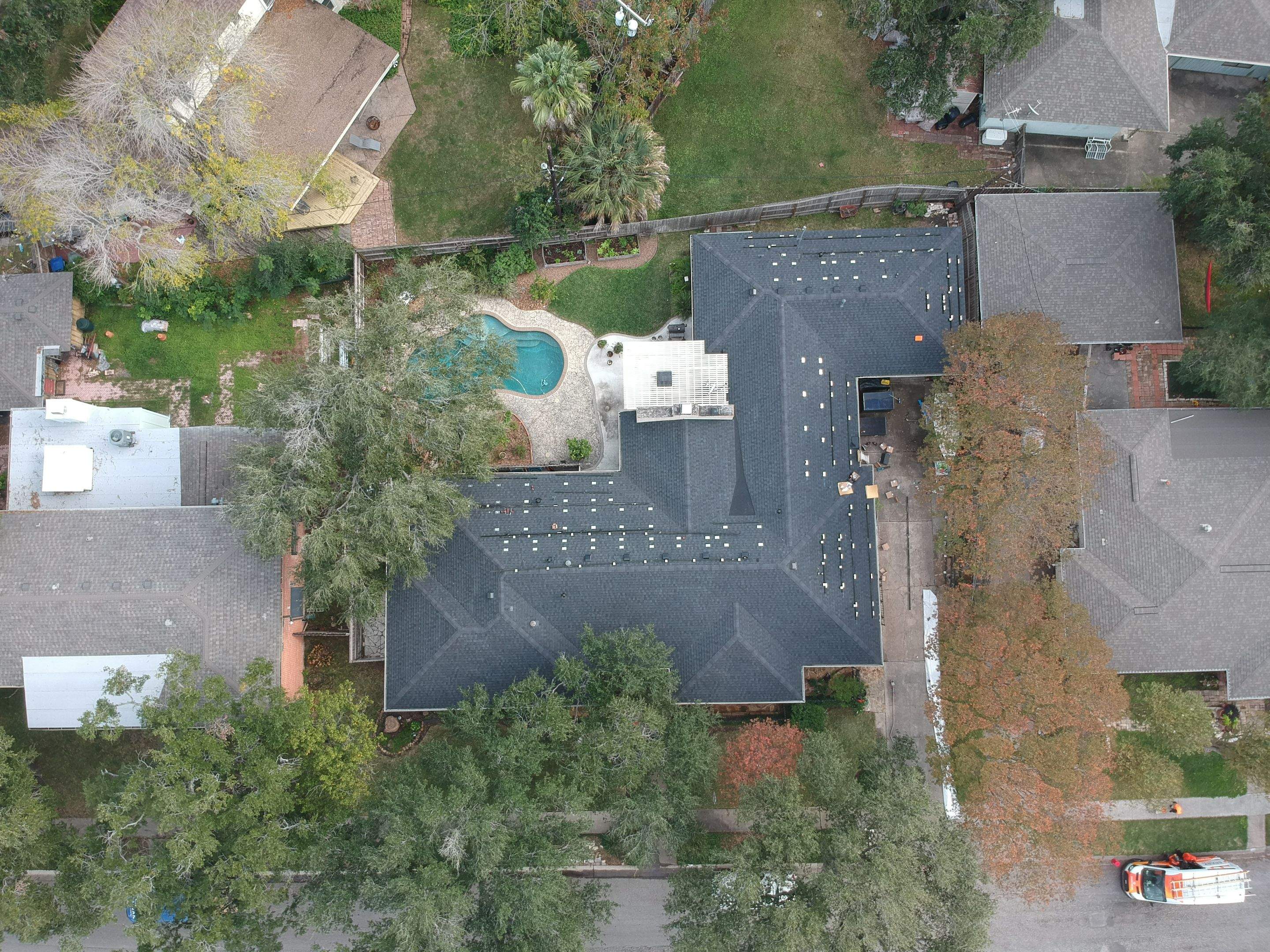 Residential Roofing Installation using Certainteed Landmark Moire Black by Galvan Roofing and Construction
