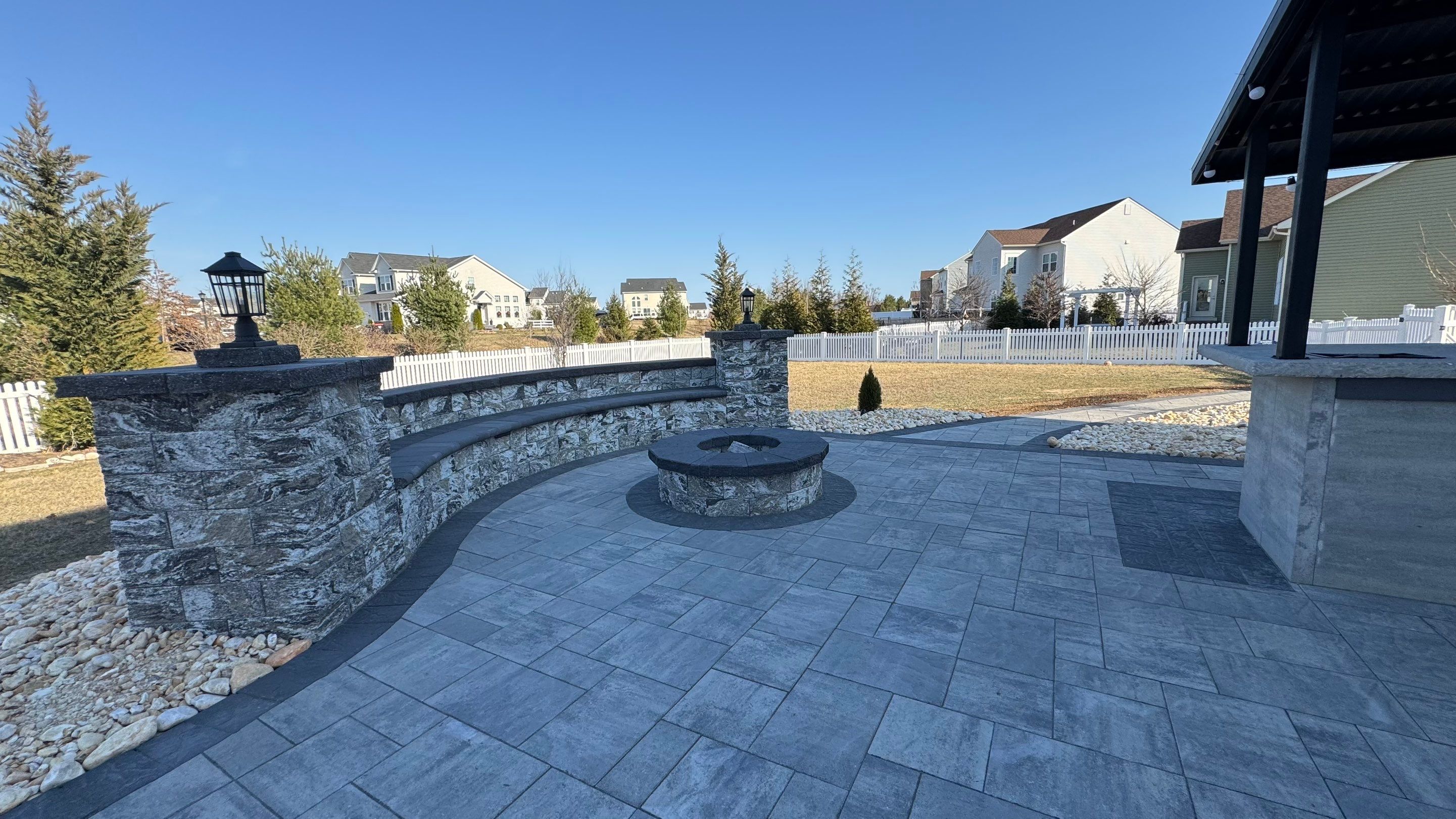 Custom Belgard patio by Studio G Indoor Spaces & Outdoor Living