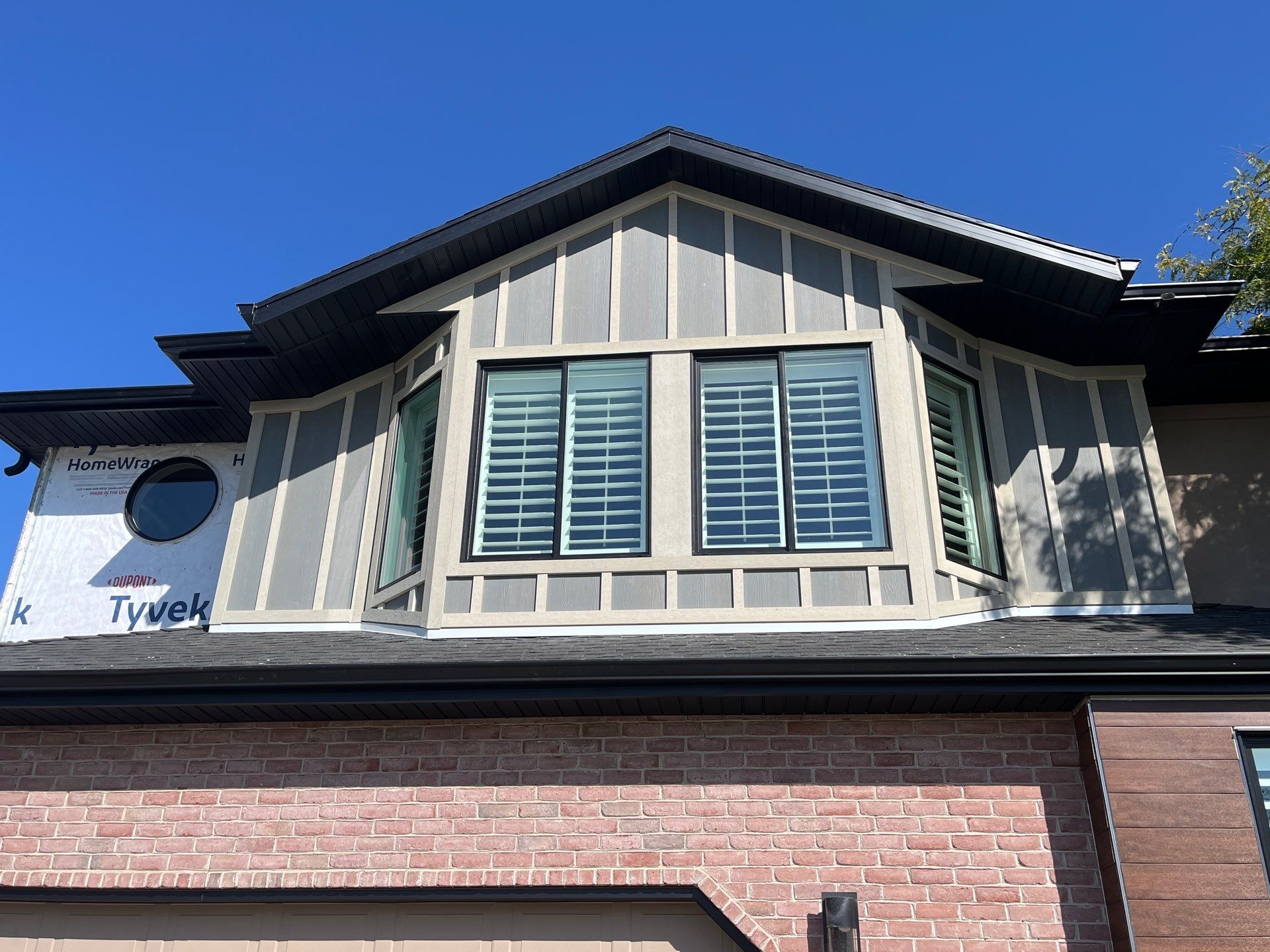 Centerville | High-End Stucco Conversion Accent | Walnut Cedar & Primed B&B by Ideal Siding Utah