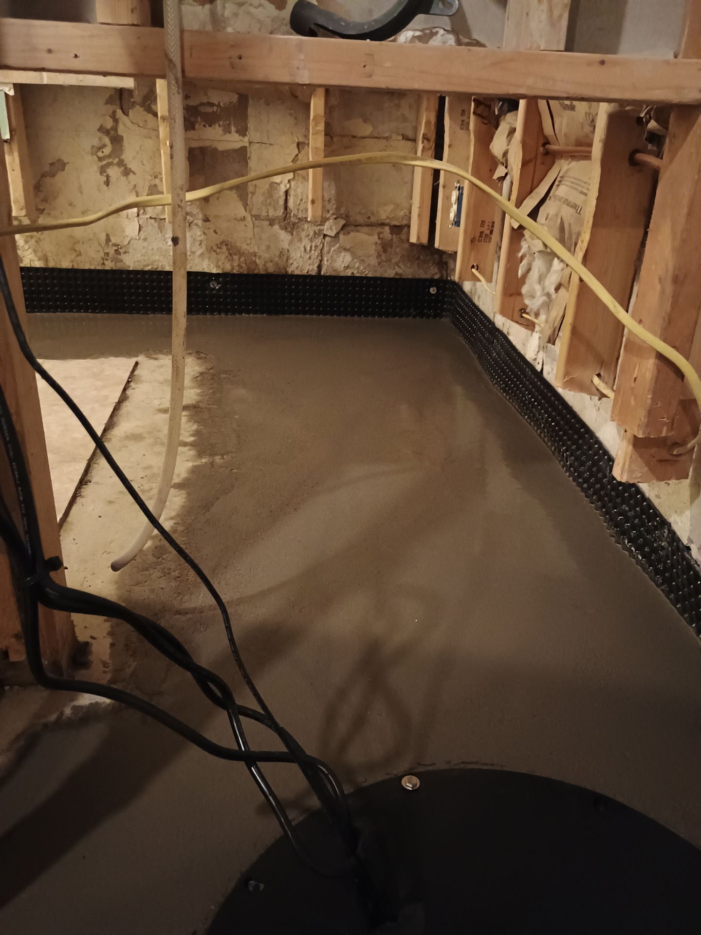 Drain Tile in Minneapolis for Kristen & Taylor by Waterproofing Northeast