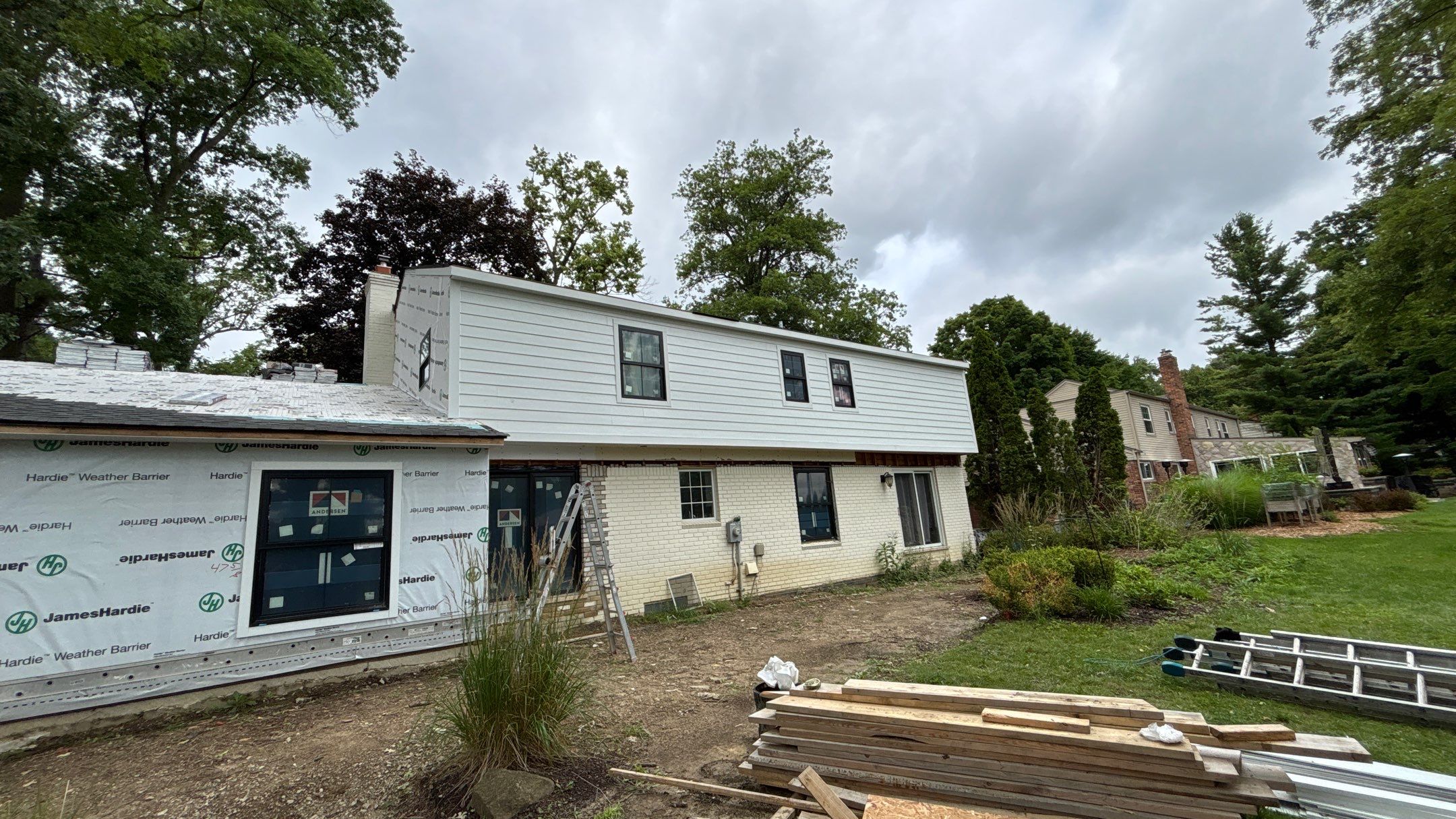 Siding Replacement using Hardie Plank S8 1/4"  Arctic White by 180 Contractors