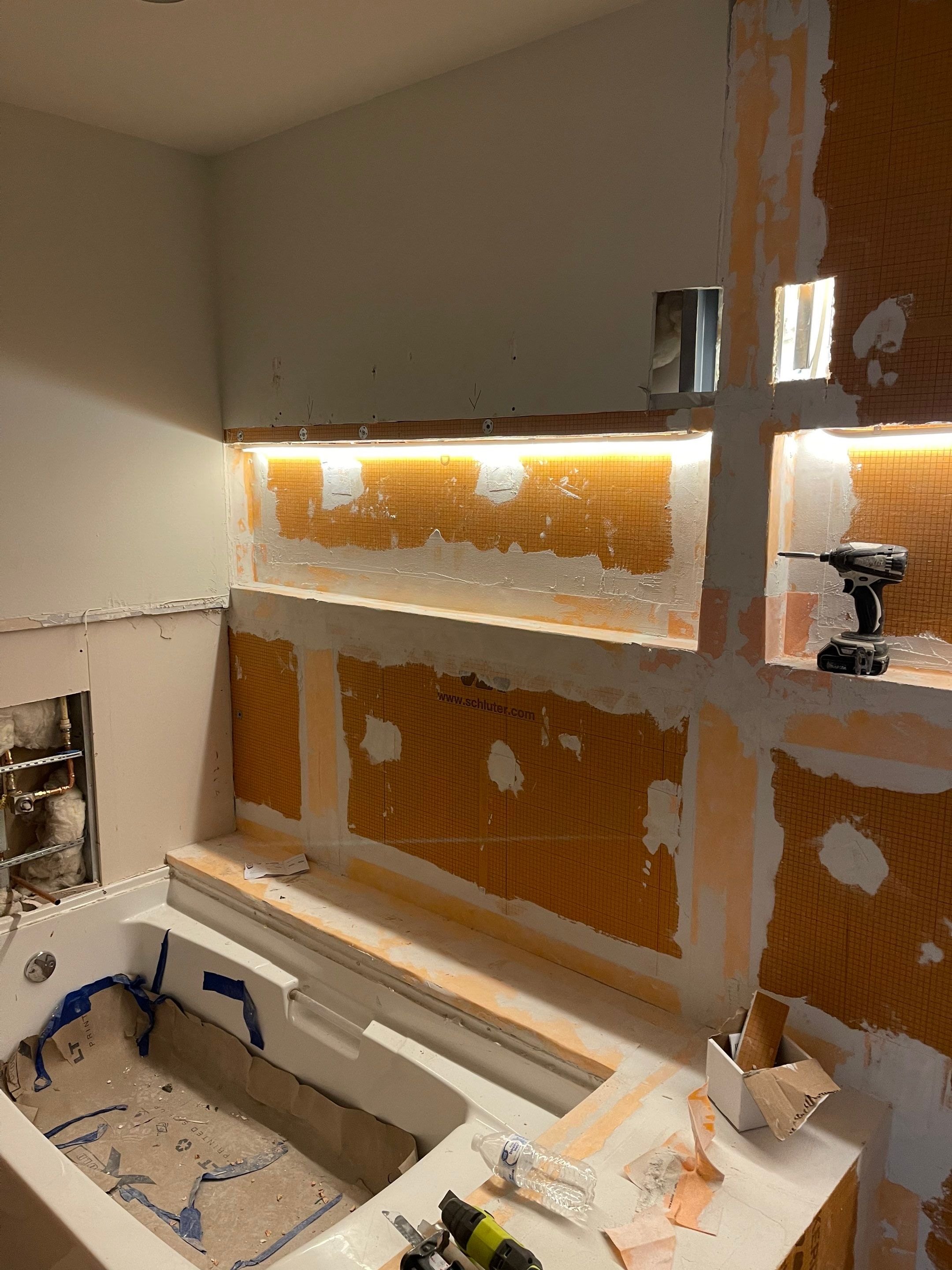 Modern Bathroom Transformation by Fine Line Flooring Inc.