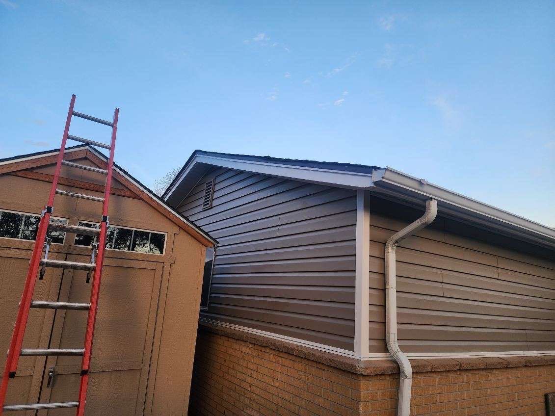 Vinyl siding installation  by United Windows and Siding LLC