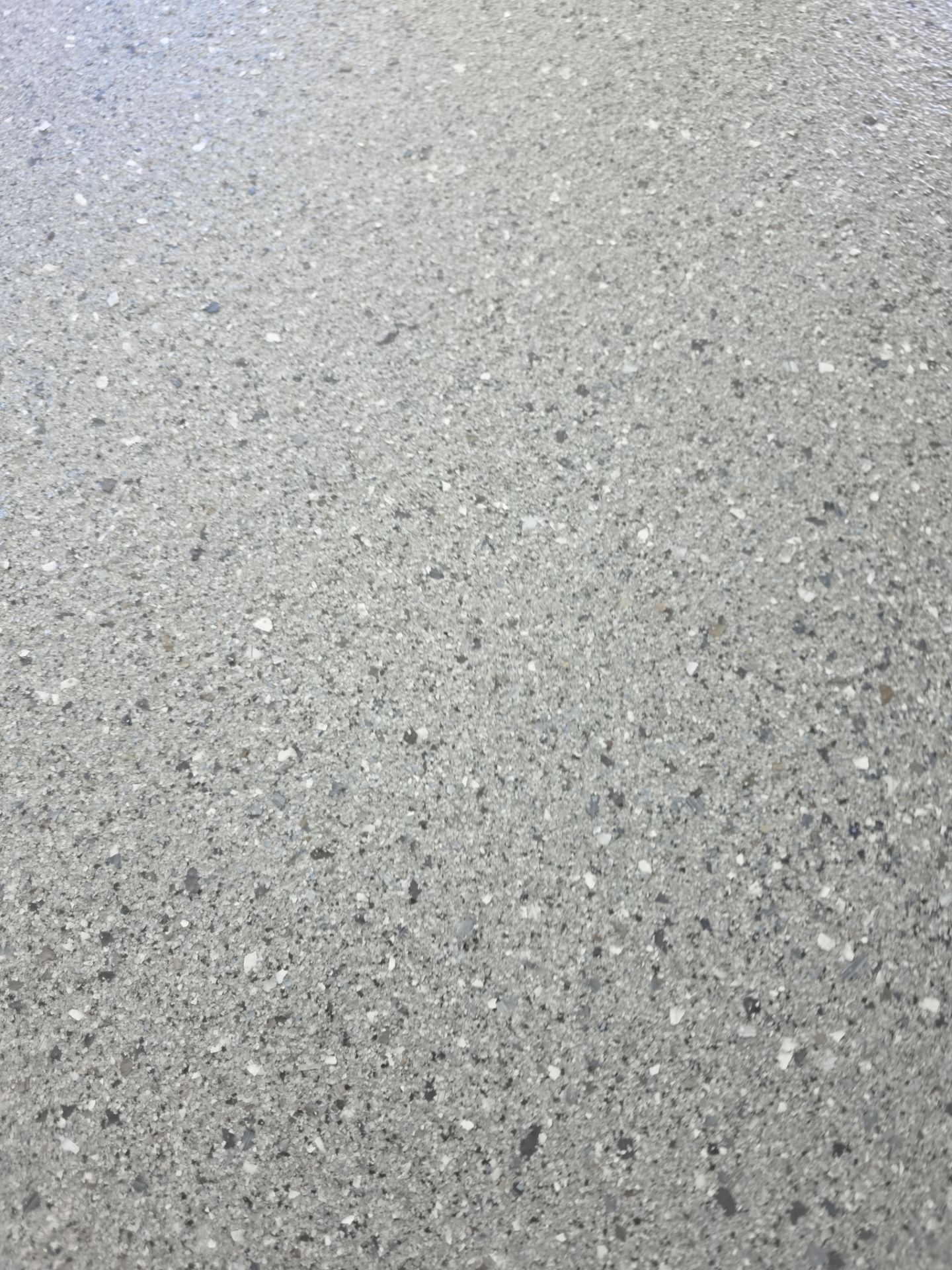Garage and Porch Concrete Floor Transformation in Rathdrum by Croc Coatings, LLC