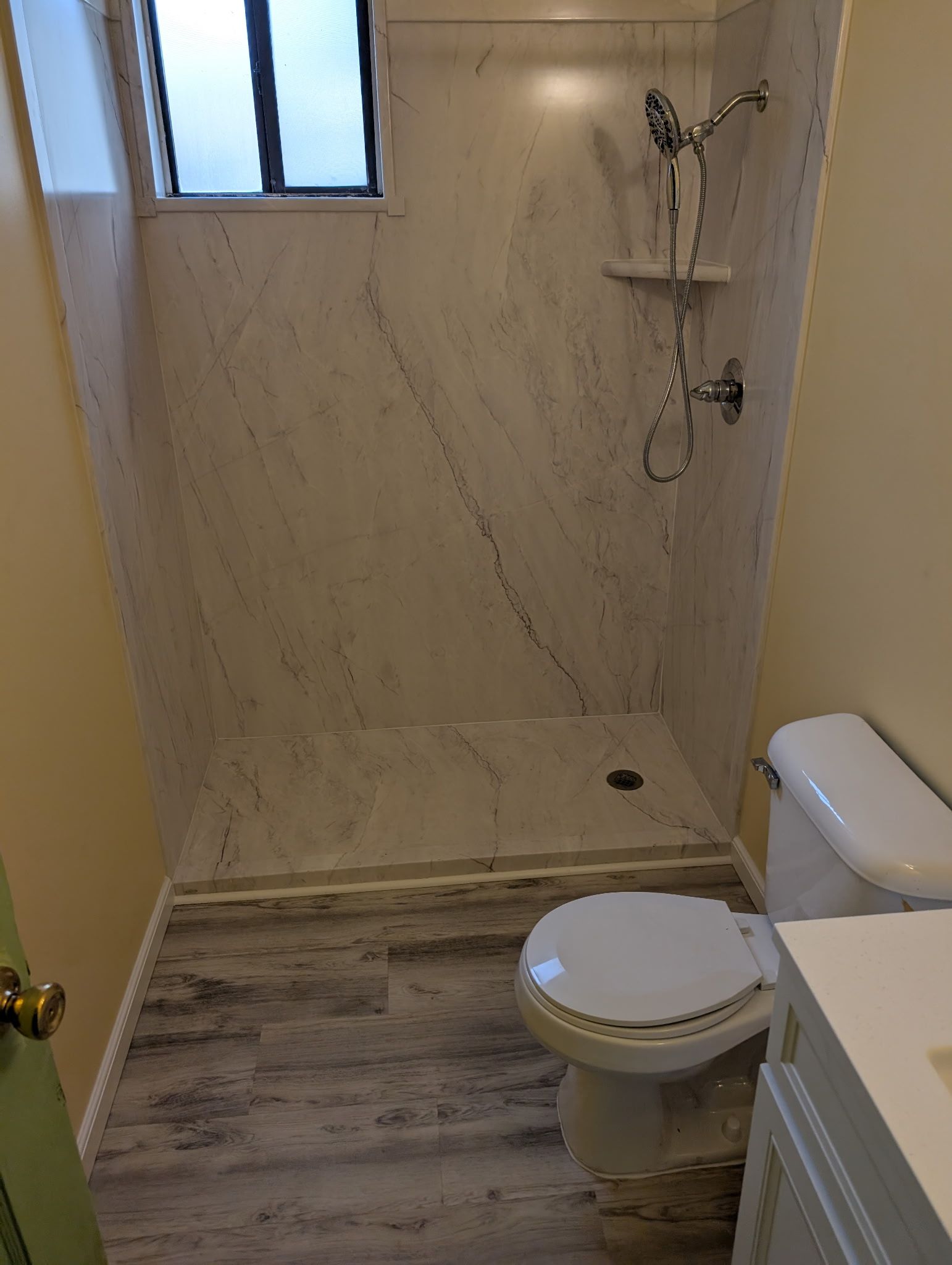 Studs to Stunning: Bathroom Remodel with FlexStone by McCray's Handyman, Inc.