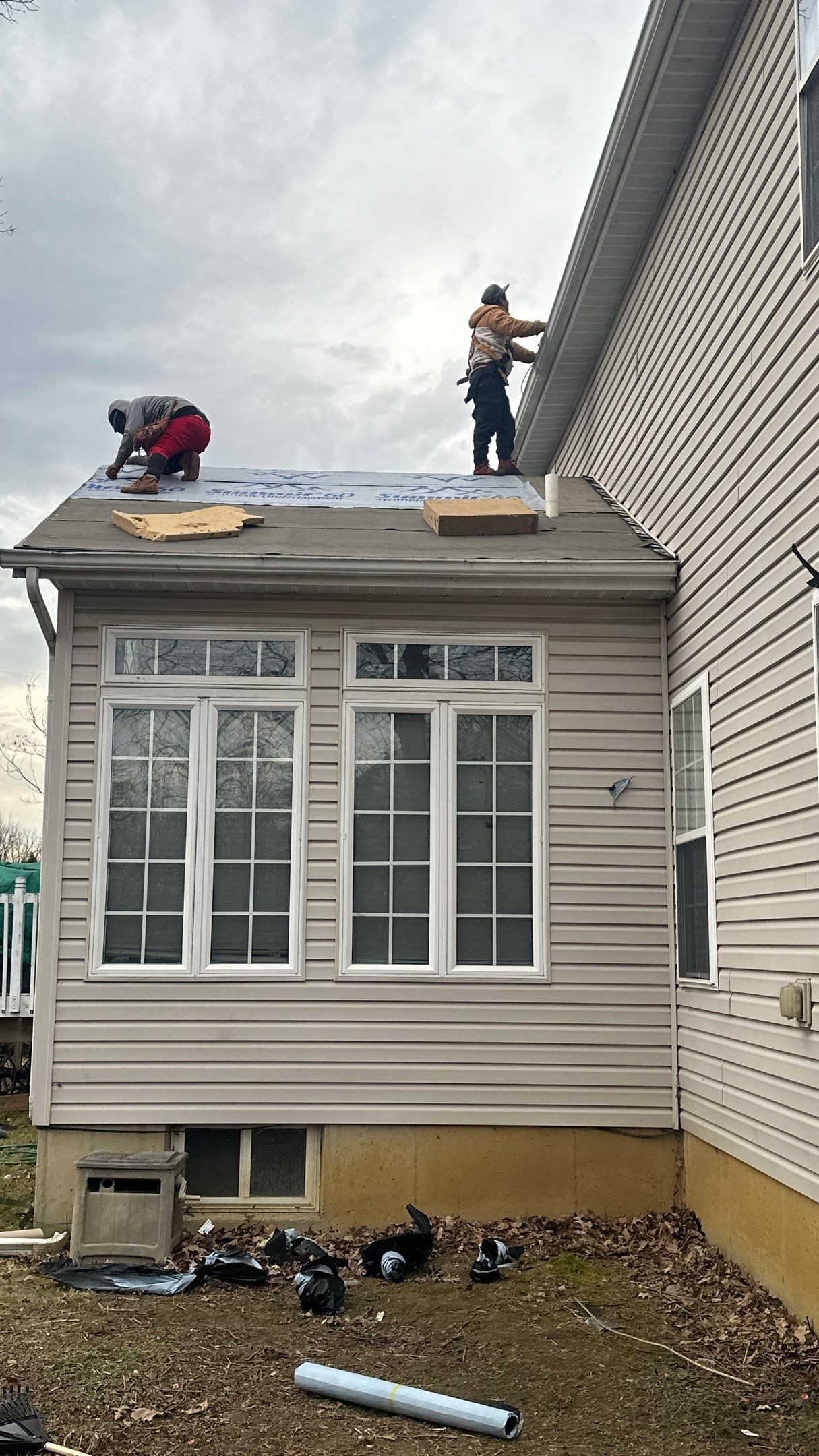 Walden Ponds - Pristine Black and Hydro Flo Gutter Guards by Tamlin Roofing