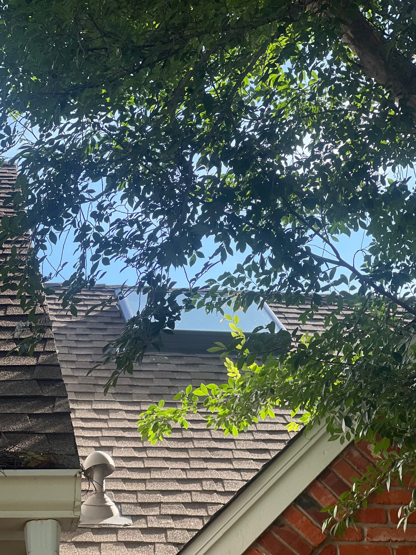 Skylight Replacement in Edmond, OK by McCann's Roofing and Construction