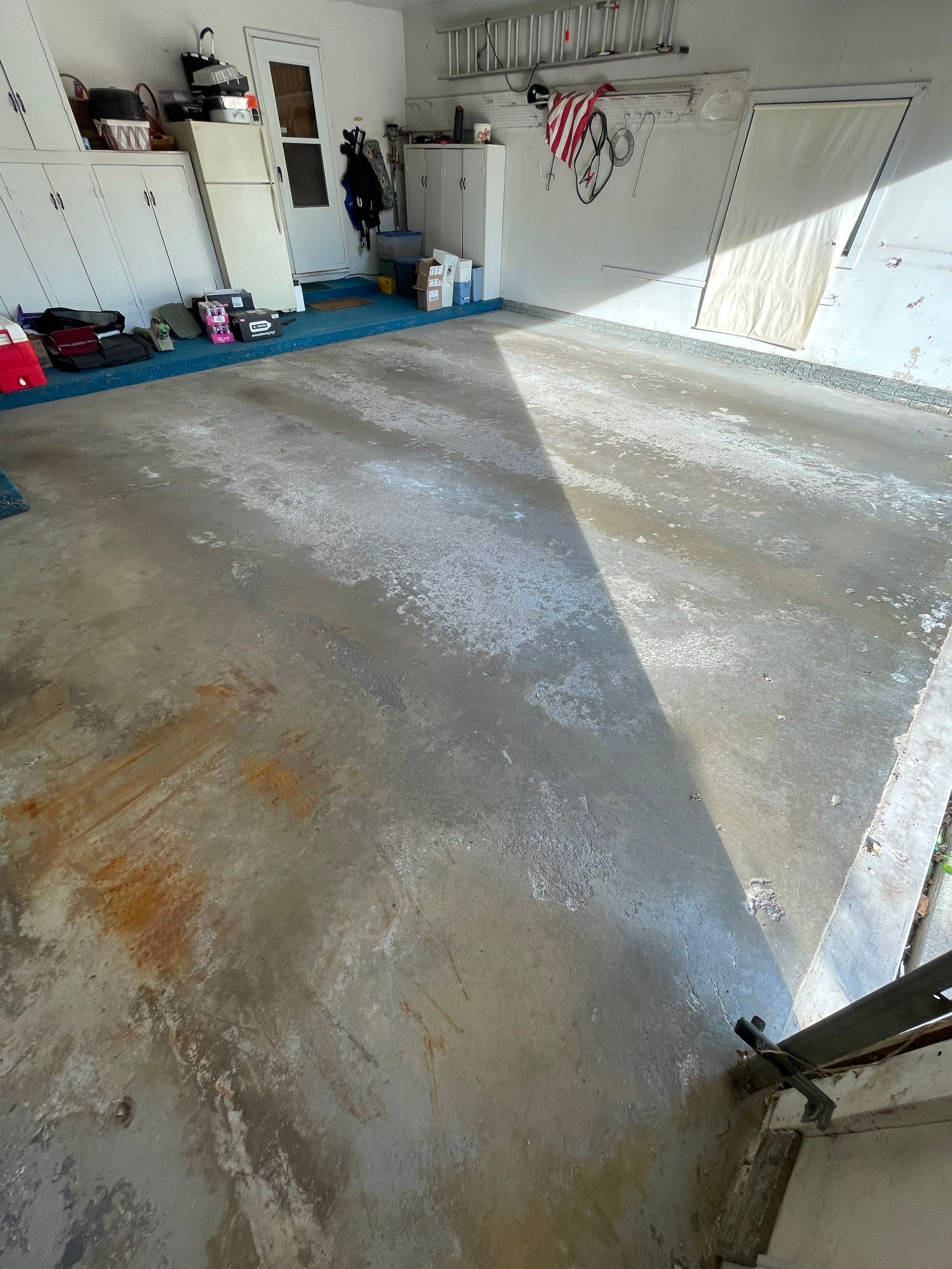 Custom Creekbed Garage Floor Coating in Sioux Falls by Select Painting, Coatings & Garage Cabinets