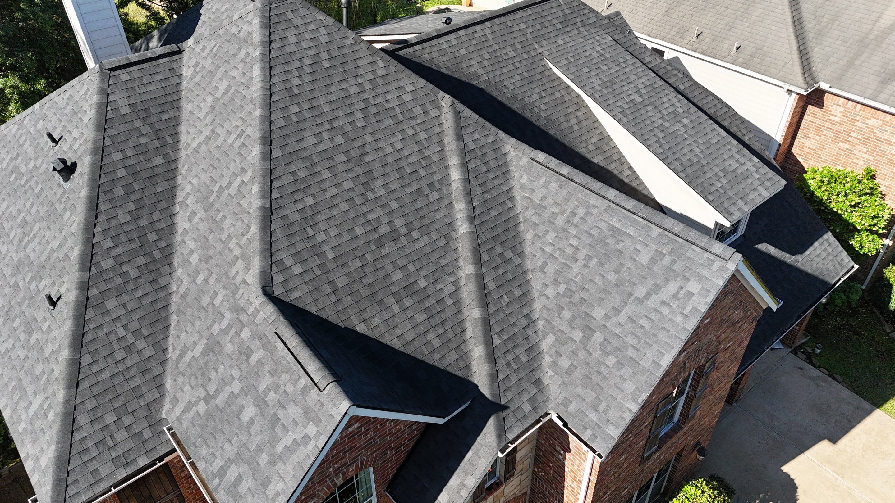 Residential Roofing Installation using Architectural Shingles by Core Four Roofing