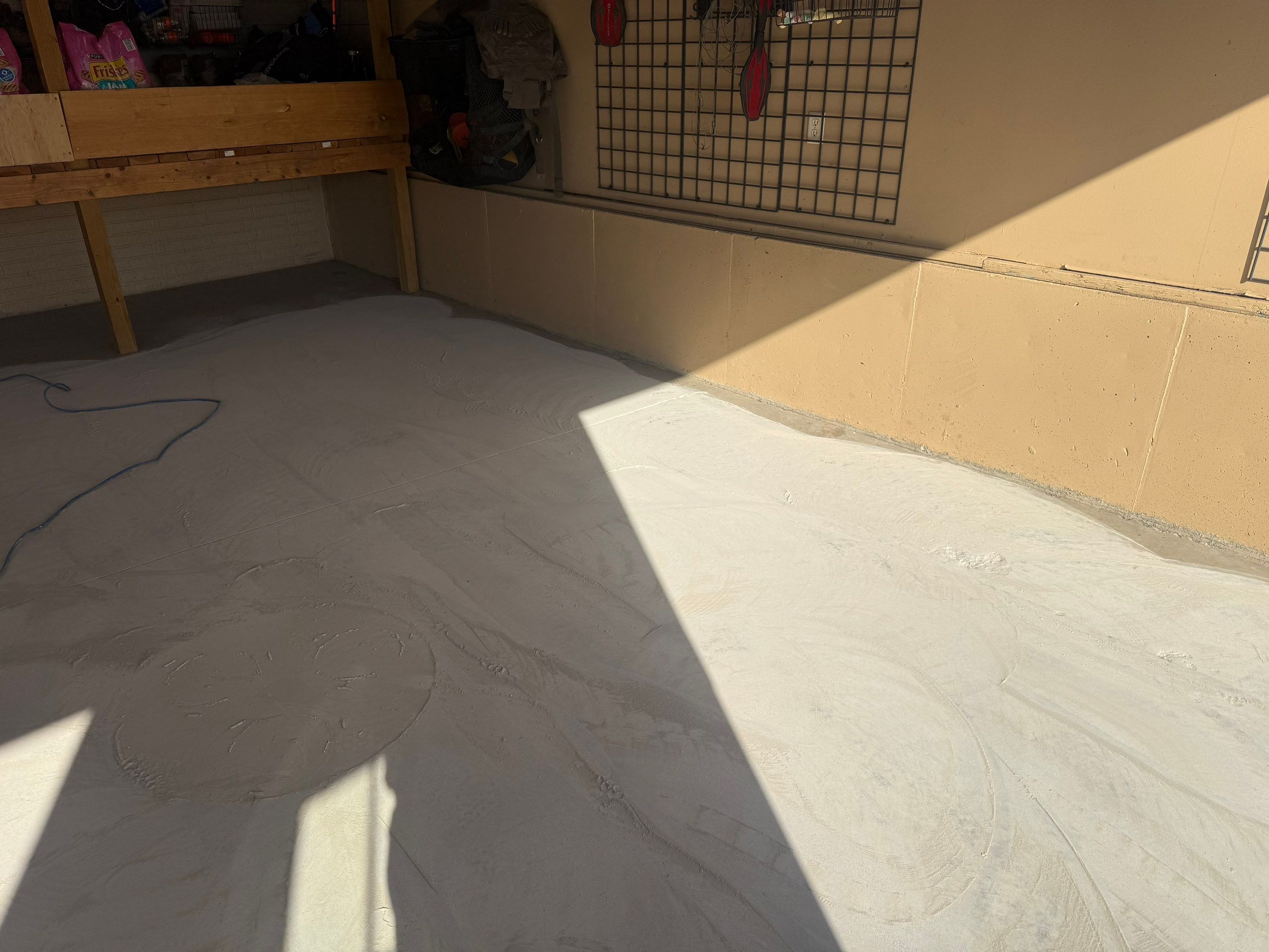 Residential Garage Floor Transformation with Speckled Epoxy Coating by Select Painting, Coatings & Garage Cabinets
