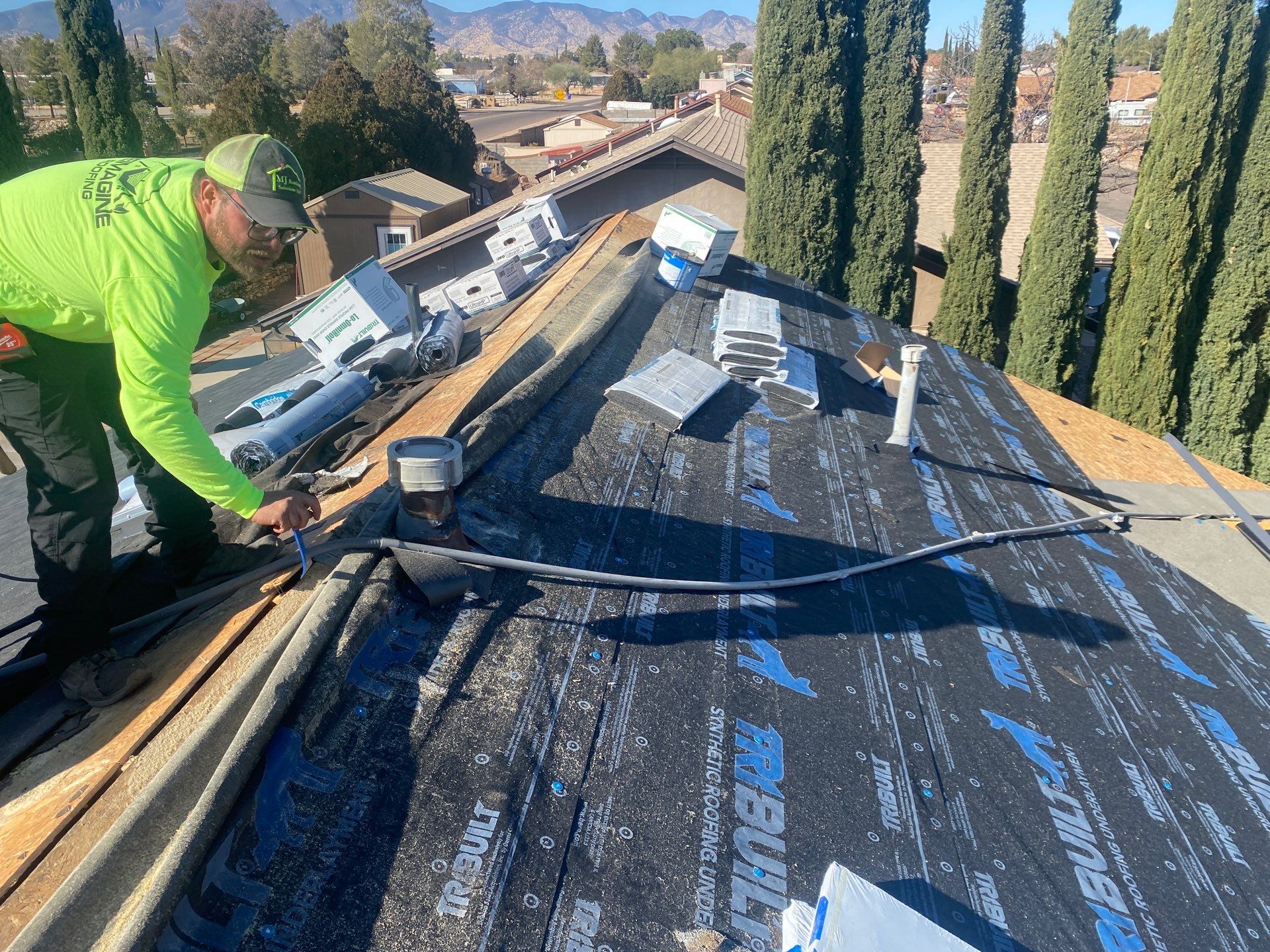 Onyx Black Shingles by Reimagine Roofing