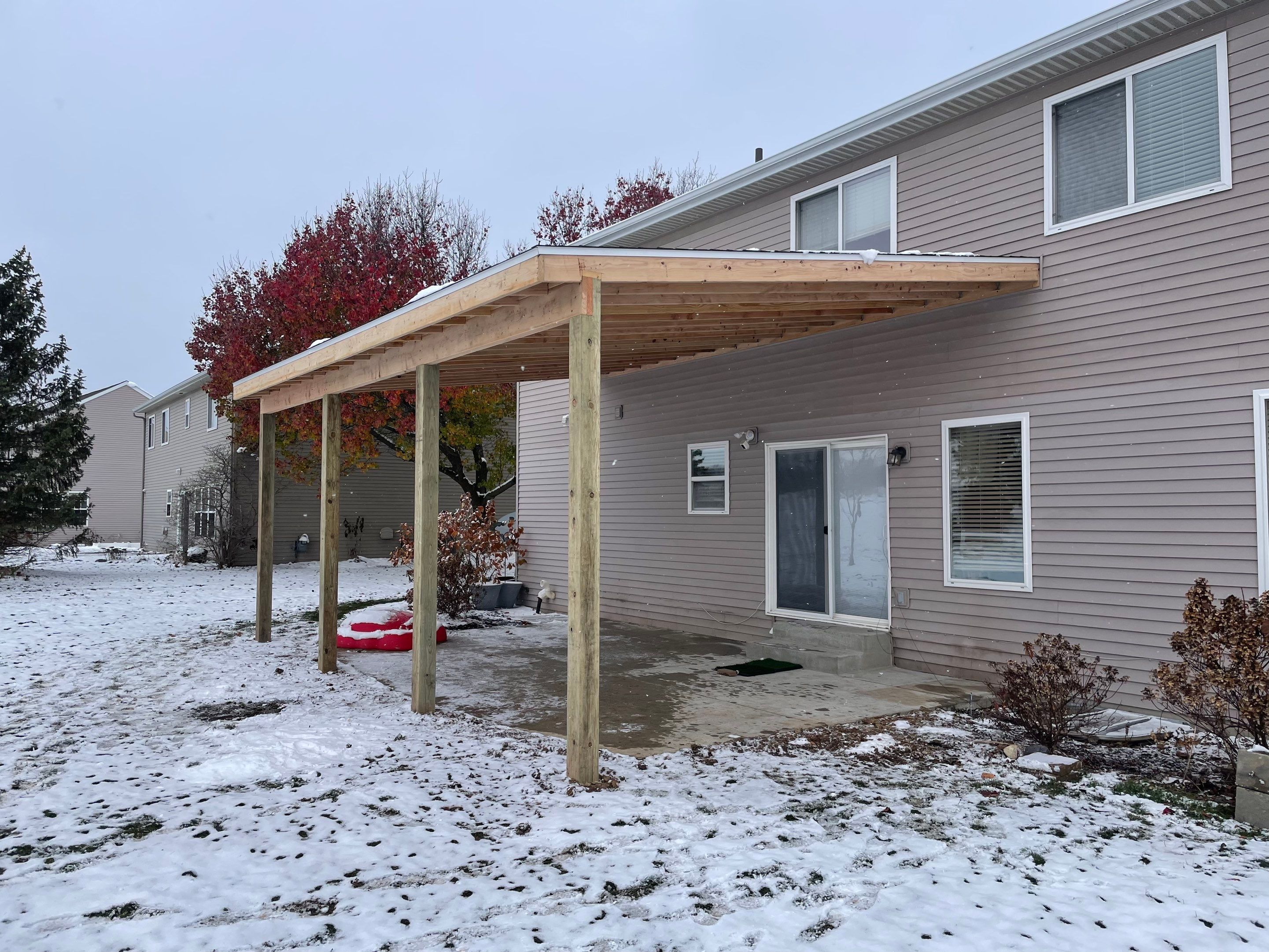 PATIO ROOF INSTALLATION using Treated Lumber by Avalon Roofing and Exteriors