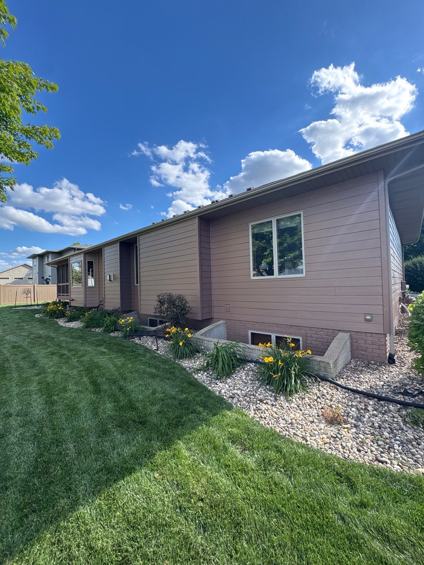 Exterior Painting and Wooden Deck Staining in Sioux Falls by Select Painting, Coatings & Garage Cabinets