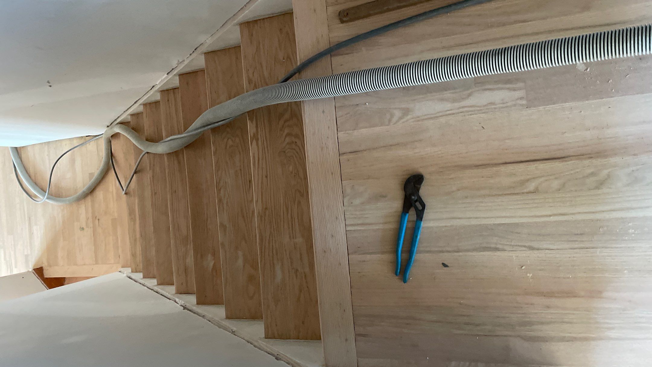 Remodeled Home with new tile floors, Showers and Refinished Oak Floors with stain and Waterbased Finish by Footprints Floors of Coastal Carolina