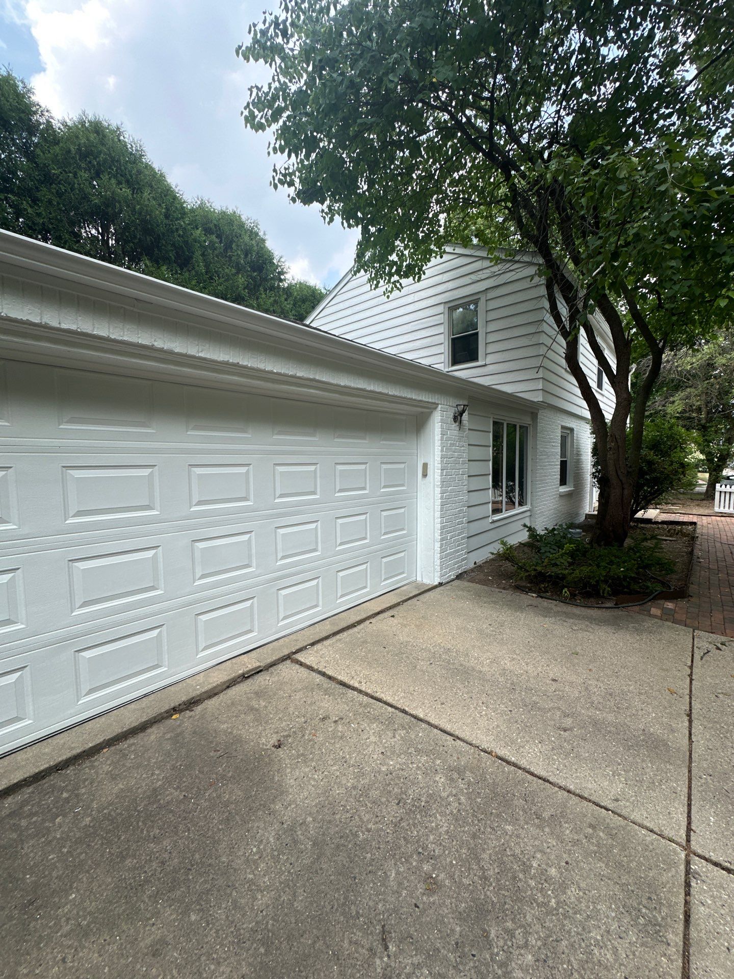Shorewood Exterior Painting and Siding Refresh With Contrast Trim by OCS Contracting Services