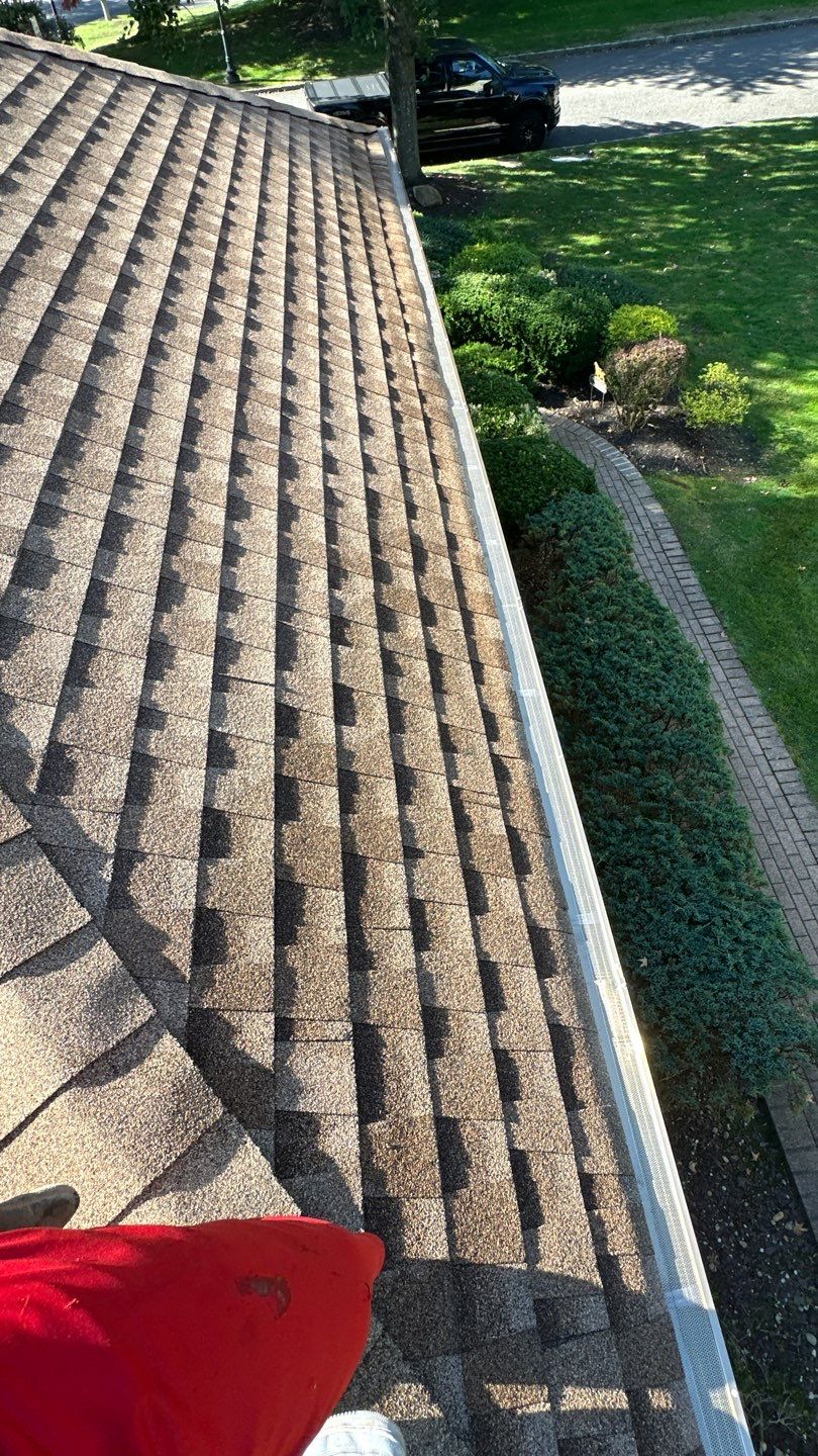 Roslyn Gutter Cleaning and Microguard Gutter Shield Installation by Above All Gutters 