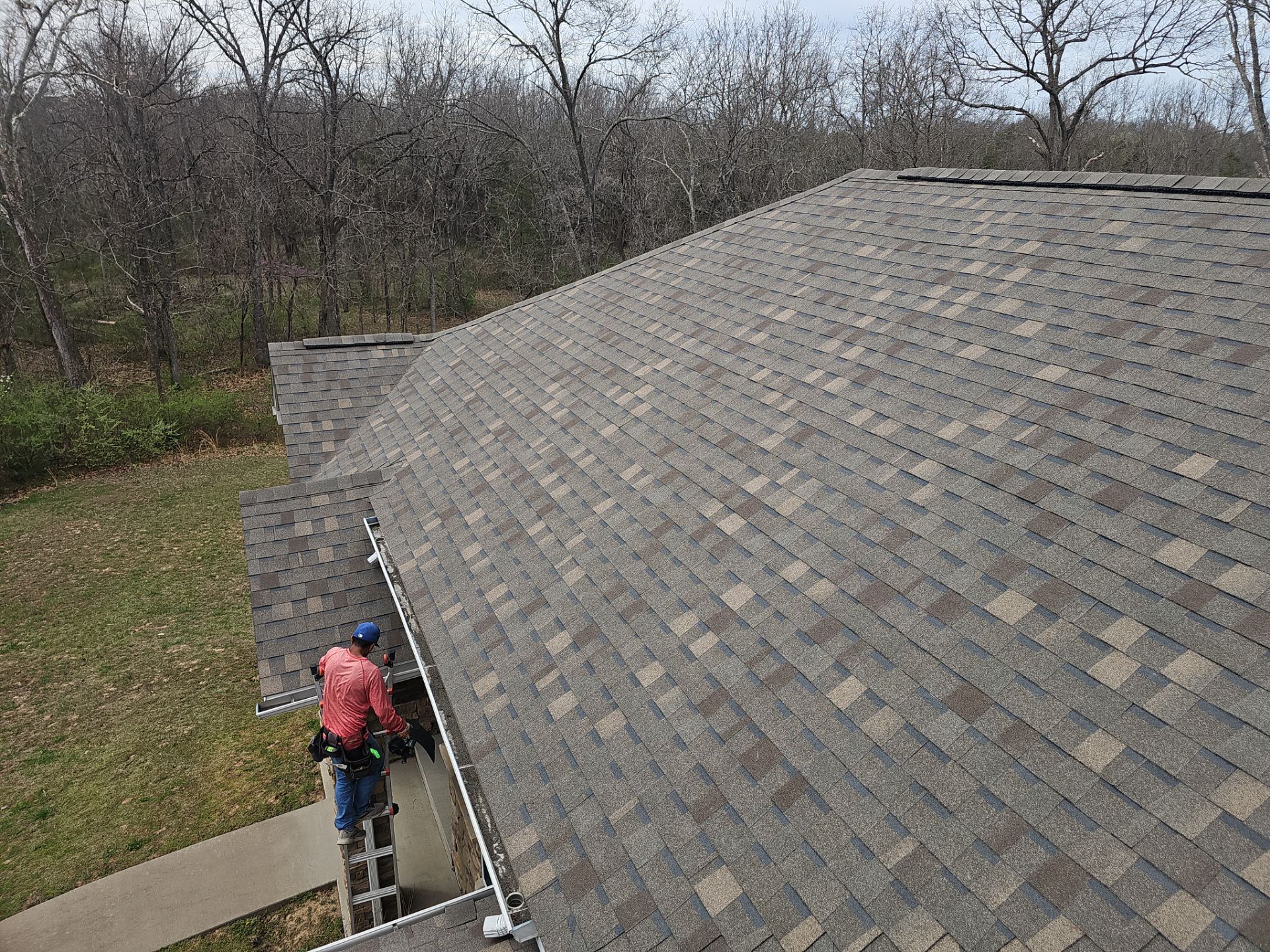 Residential Roofing & Gutter Cover Install  by Titan Commercial & Residential Roofing 